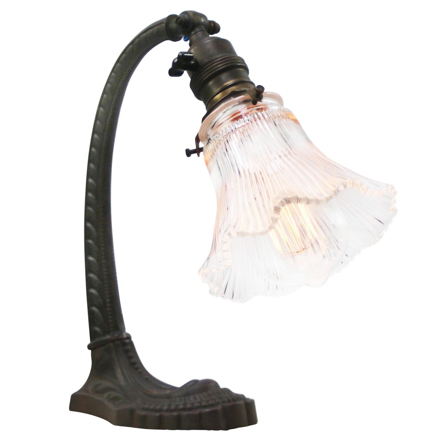 French 1920s desk light.
Cast Iron Base and arm with Holophane glass shade.
Black cotton wire and plug.

Also, available with US/UK plug

Priced per individual item. All lamps have been made suitable by international standards for incandescent light
