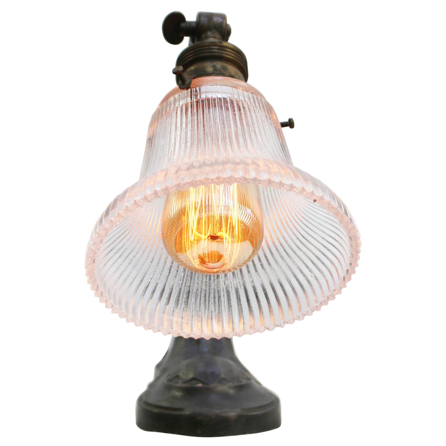 French 1920s desk light.
Cast Iron Base and arm with Holophane glass shade.
Black cotton wire and plug.

Also, available with US/UK plug

Priced per individual item. All lamps have been made suitable by international standards for incandescent light