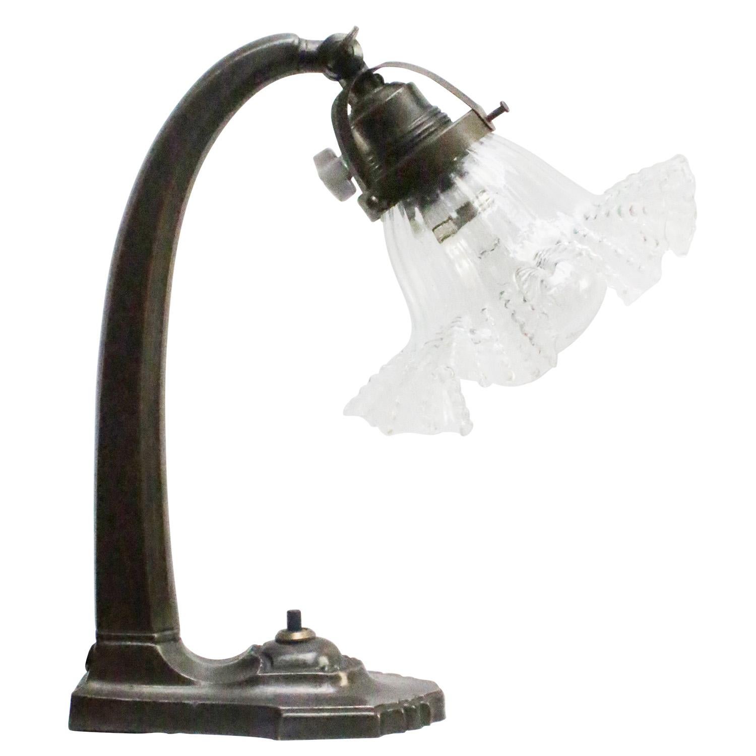 French 1930s, Art deco, clear glass, cast desk light / table lamp
2,5 meter black cotton wire, plug and switch

Also, available with US/UK plug

Priced per individual item. All lamps have been made suitable by international standards for