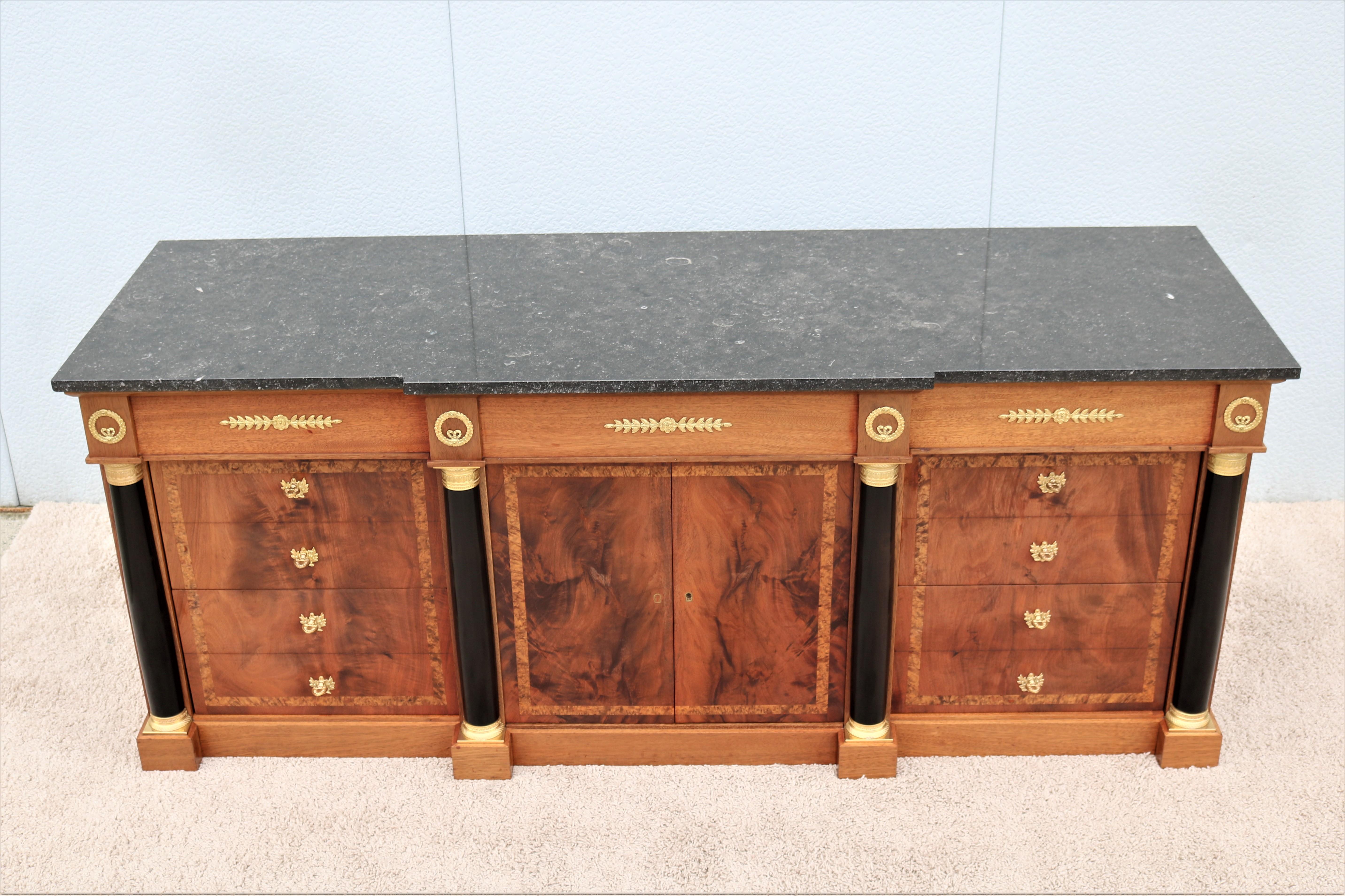 Vintage French Empire 19th century style wonderful mahogany and fabulous black seashell marble top credenza cabinet, in the manner of Georges Jacob-Desmalter.
This cabinet look striking and magnificent with rich deep mahogany decorated with