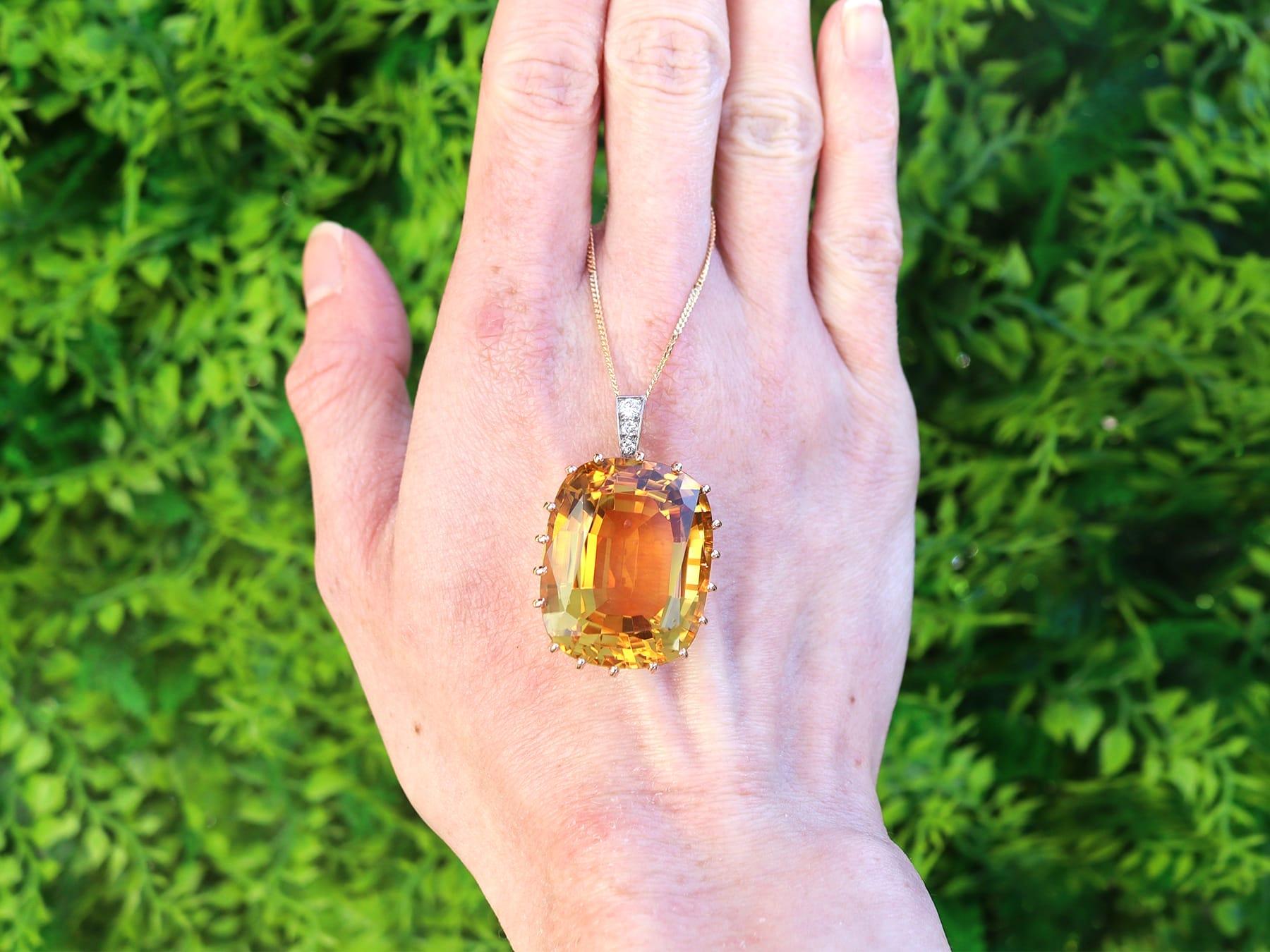 A stunning, fine and impressive vintage French 64.39 carat citrine and 18 karat yellow gold pendant; part of our diverse gemstone jewellery collections

This stunning, fine and impressive vintage pendant has been crafted in 18k yellow gold.

The