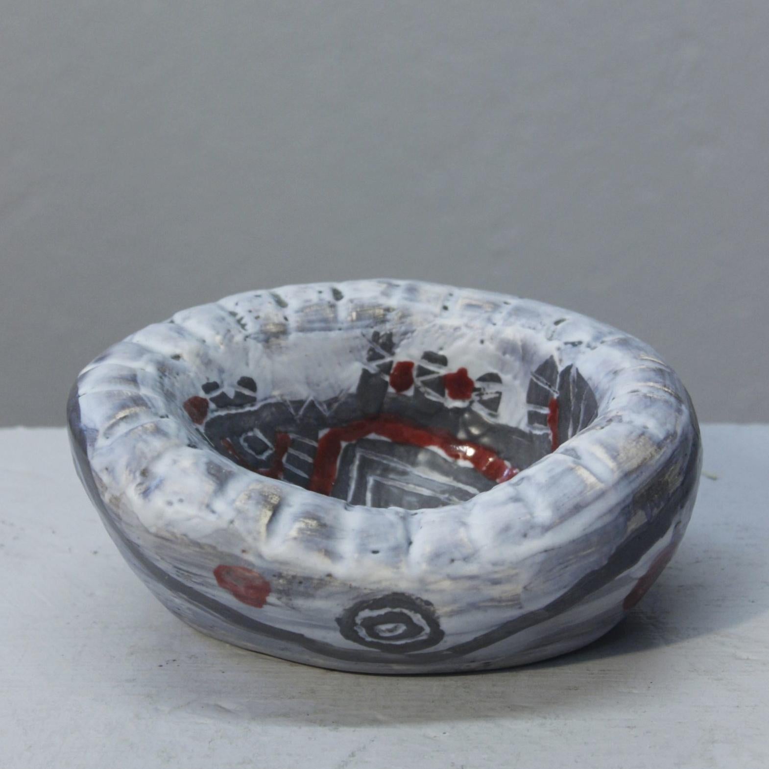 Ashtray with central fish design of Africanist inspiration by Lysiane & Yvon Bonnet, Hyères workshop circa 1970.

In very good condition, signed on the underside.

Height : 7 cm / Width : 16 cm / Depth : 13 cm / Weight : 0.3 kg