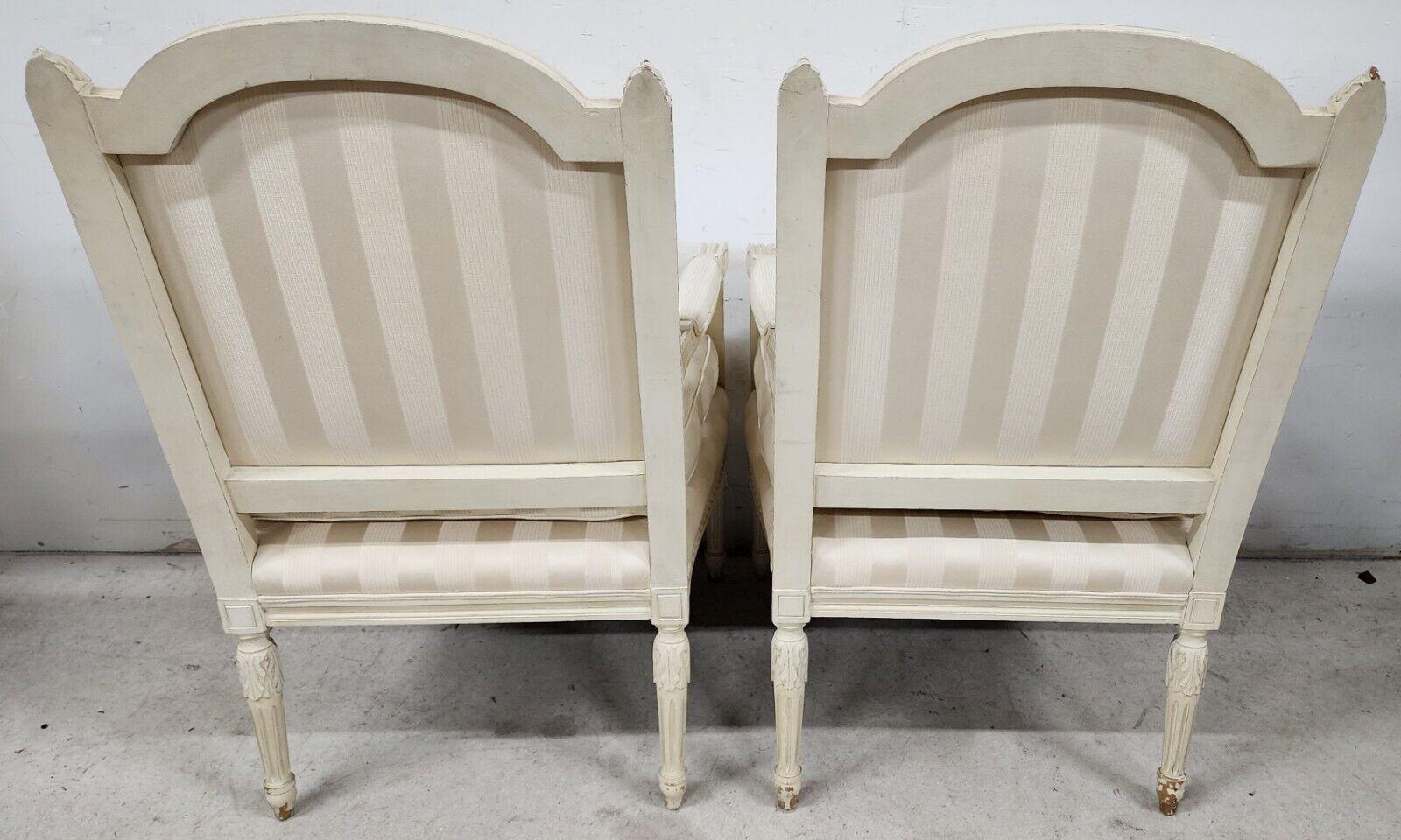 Offering one of our recent Palm Beach estate fine furniture acquisitions of a
Pair of vintage french style Shabby Chic distressed armchairs
Cushions are very comfortable and soft and they bounce back when you get up.

Approximate measurements in