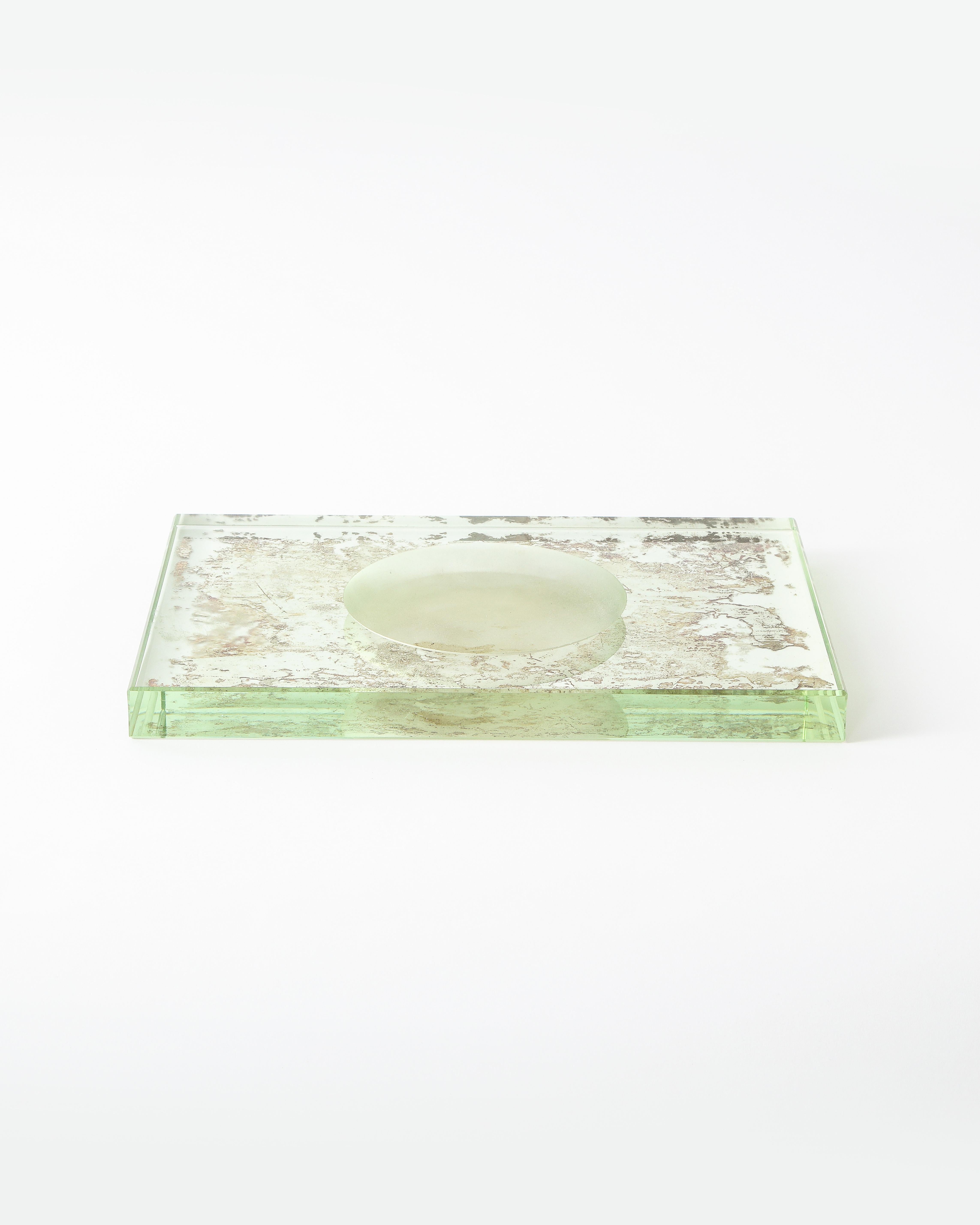 Decorative dish in Classic French cast glass from the St. Gobain foundry.

A solid heavy piece of sandblasted glass, this sculptural piece has great mass complemented by the model effect of the antique mirror backing.

Modernist lines. Excellent