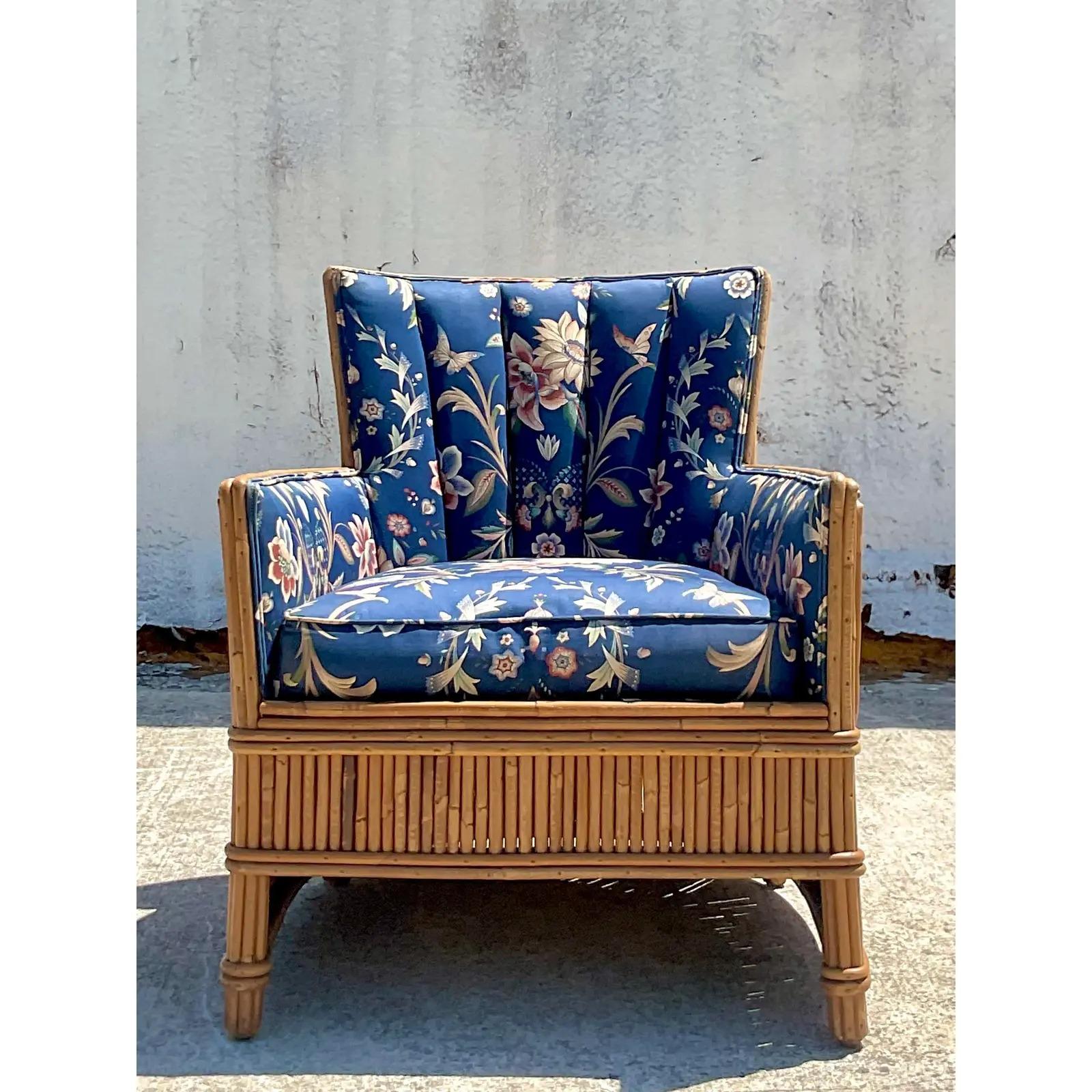 Stunning vintage French Art Deco lounge chair. A beautiful pencil reed frame with a beautifully upholstered seat. Perfect as is or change to your favorite fabric. Matching sofa, chair and tables also available.