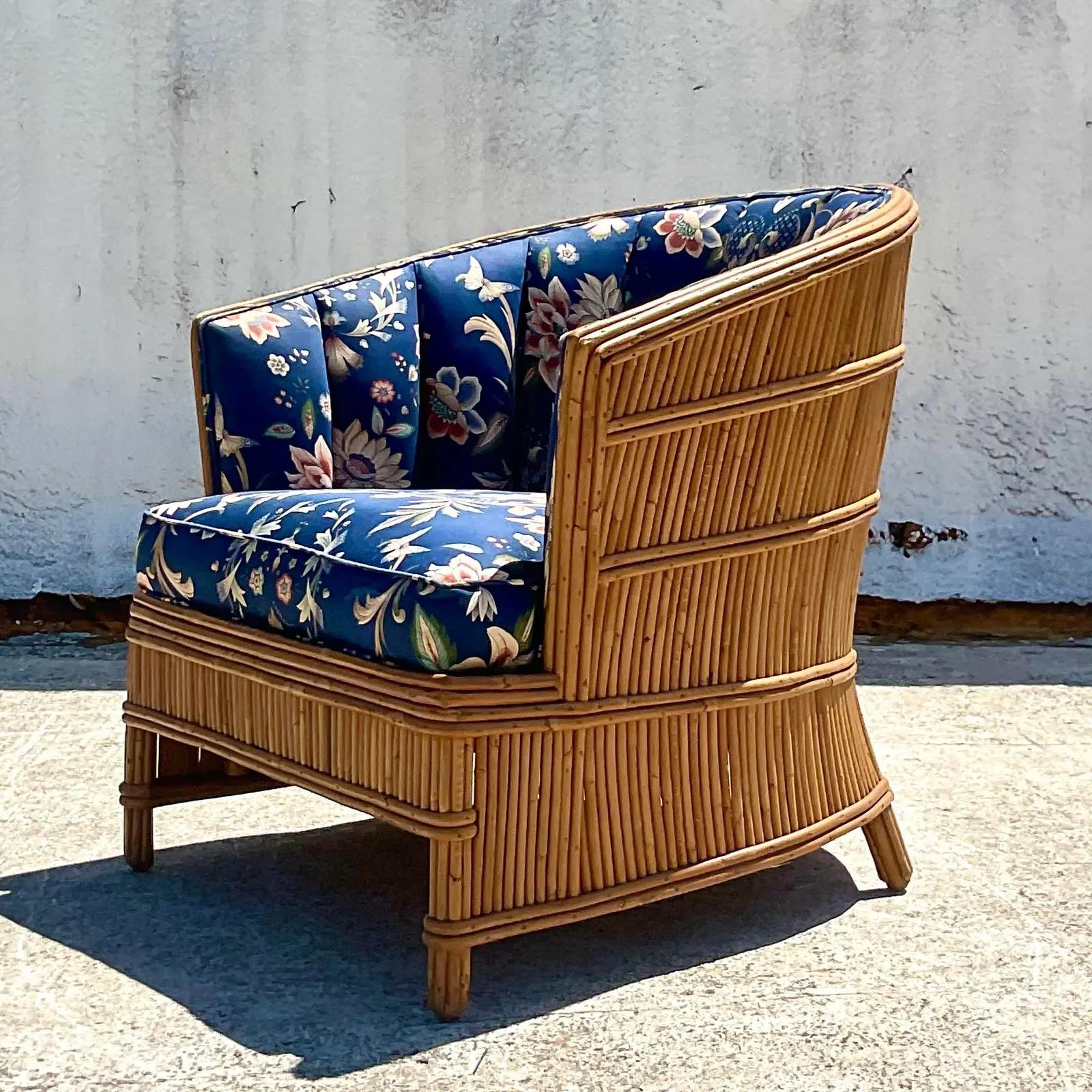 Fantastic vintage French Art Deco lounge chairs. Beautiful pencil reed frame with a channel tufted upholstered seat. Matching sofa and chair and side tables also available. Acquired from a Palm Beach estate.