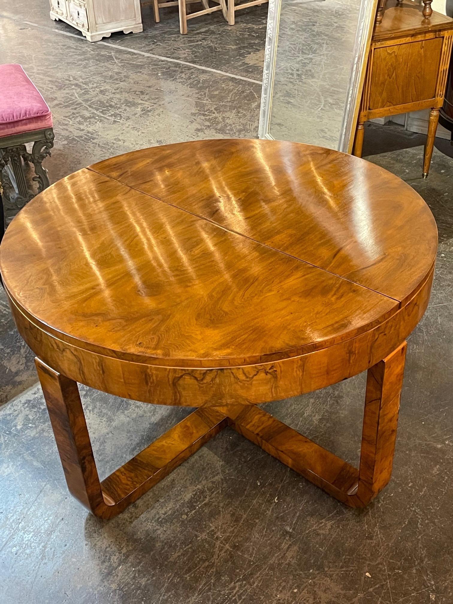Very fine vintage French Art Deco style walnut center table. Beautiful finish on this sophisticated piece. Creates a fabulous polished look!
