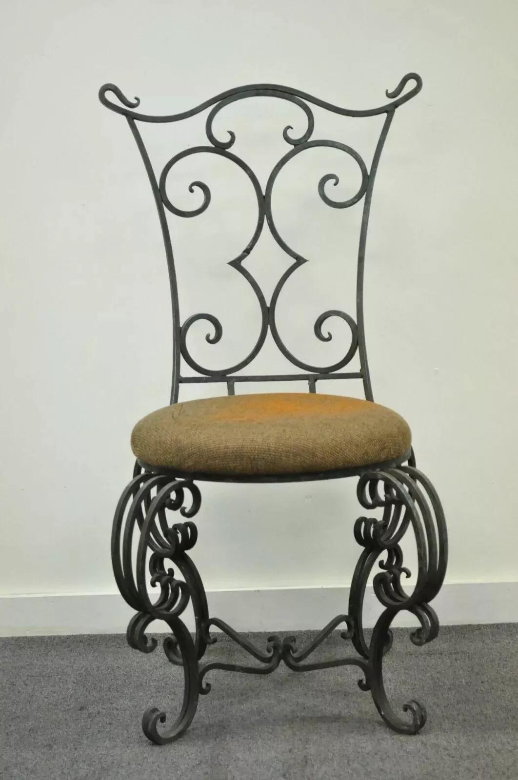 Vintage French Art Nouveau Style Hand Forged Scrolling Wrought Iron Side Chair. Item features an ornate back rest, finials, legs, and stretcher supported base. Circa Mid 20th Century. Measurements: 37.75