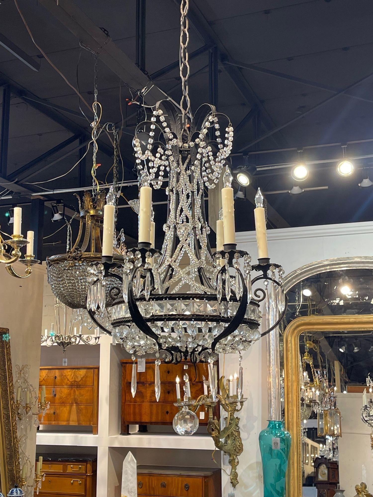 Beautiful elegant vintage Bagues style iron and crystal chandelier with 6 lights. Lovely scale and shape on this fixture. A gorgeous piece!