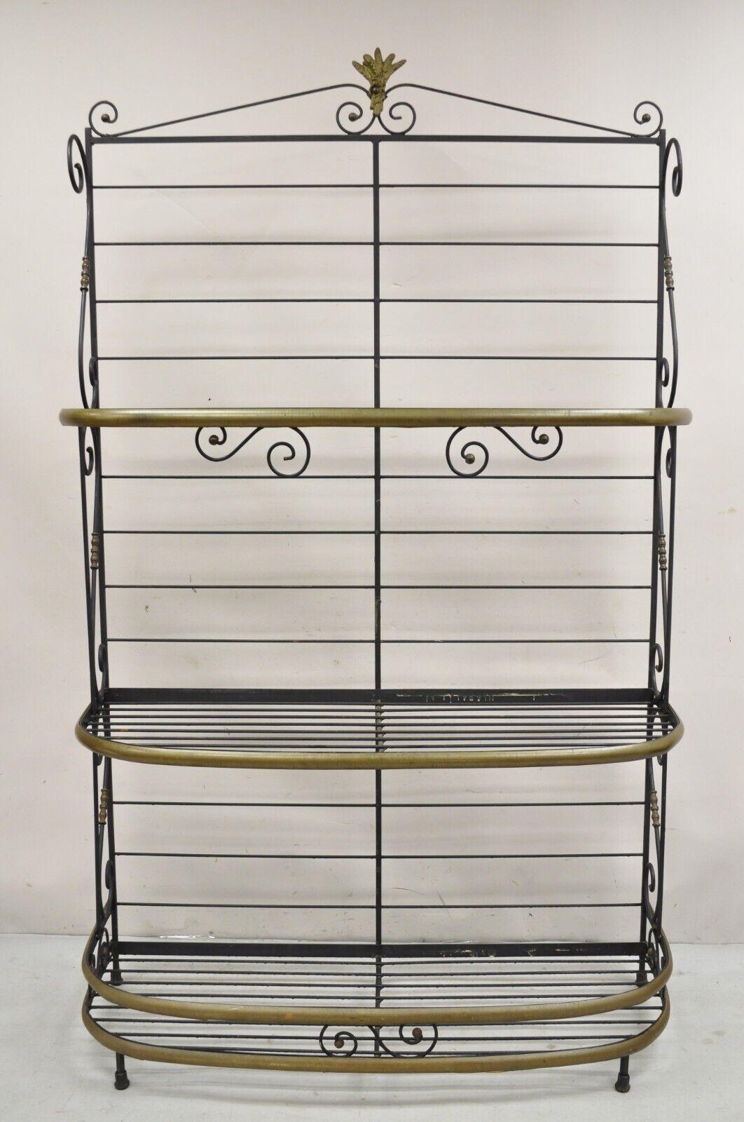 Vintage French Bakers Rack 3 Tier Scrolling Wrought Iron and Brass Etagere. Circa Early to Mid 20th Century. Measurements: 81.5