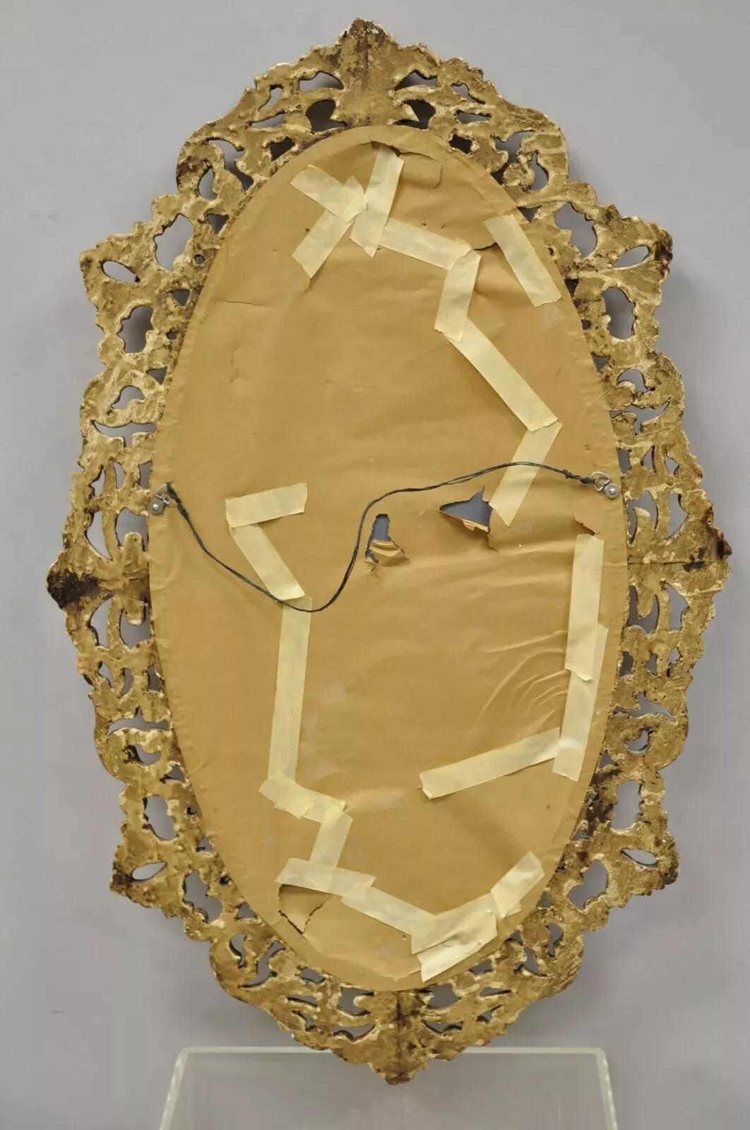 Specchio da parete ovale d'epoca in stile barocco francese, intagliato in oro e legno di Giltwood in vendita 1