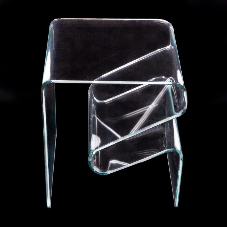 Modernist French bent glass side or occasional table incorporating magazine holder into its bent form.

 