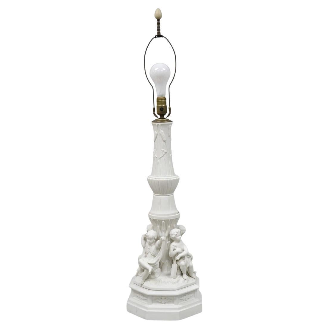 Lampe de table vintage en porcelaine bisque blanche à figurines de chérubins maritimes