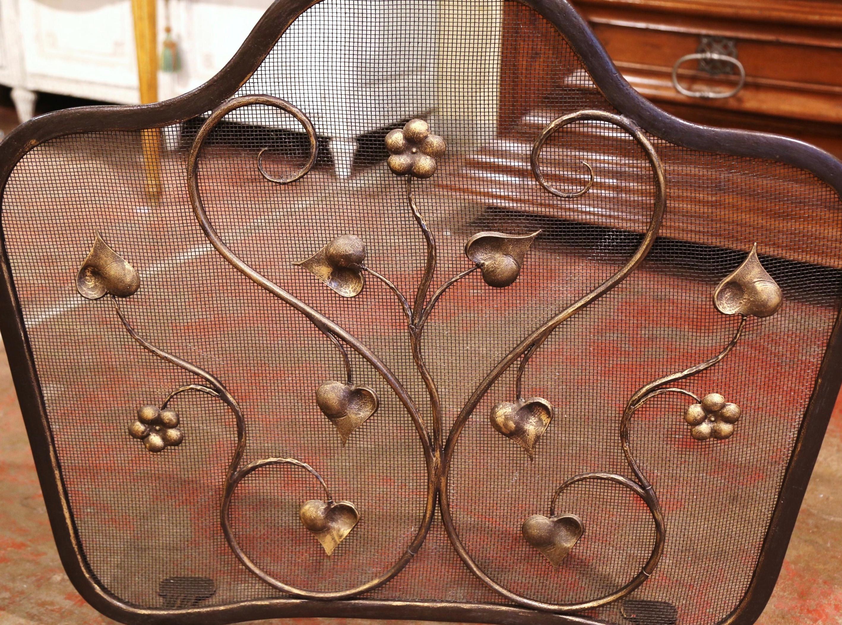 Vintage French Black and Gilt Wrought Iron Fireplace Screen with Protective Mesh In Excellent Condition In Dallas, TX
