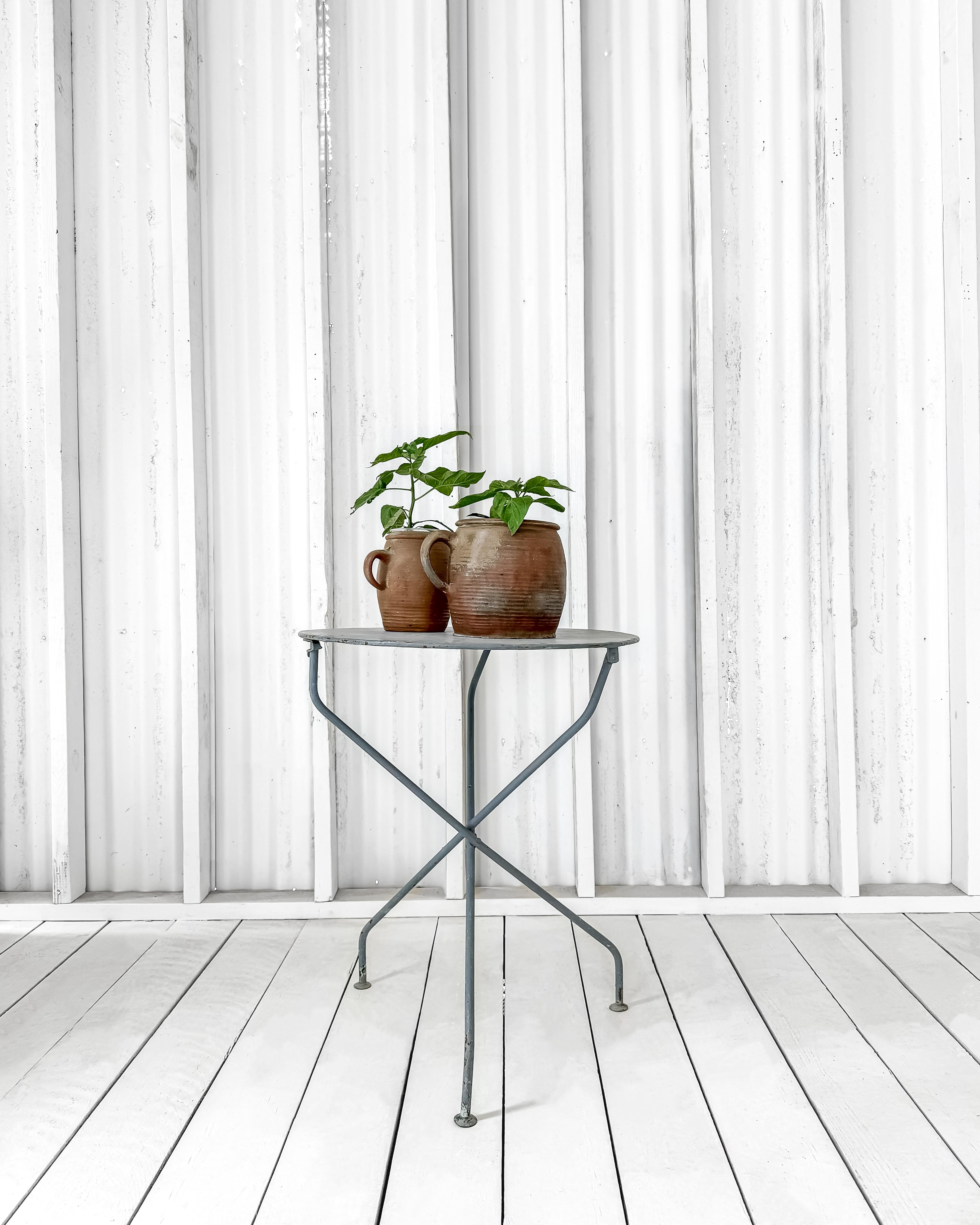 A lovely versatile vintage metal table, featuring a simple and chic design that complements any decor style. Crafted for indoor or outdoor use, this table is as practical as it is stylish.

Constructed from durable metal, this table is built to last