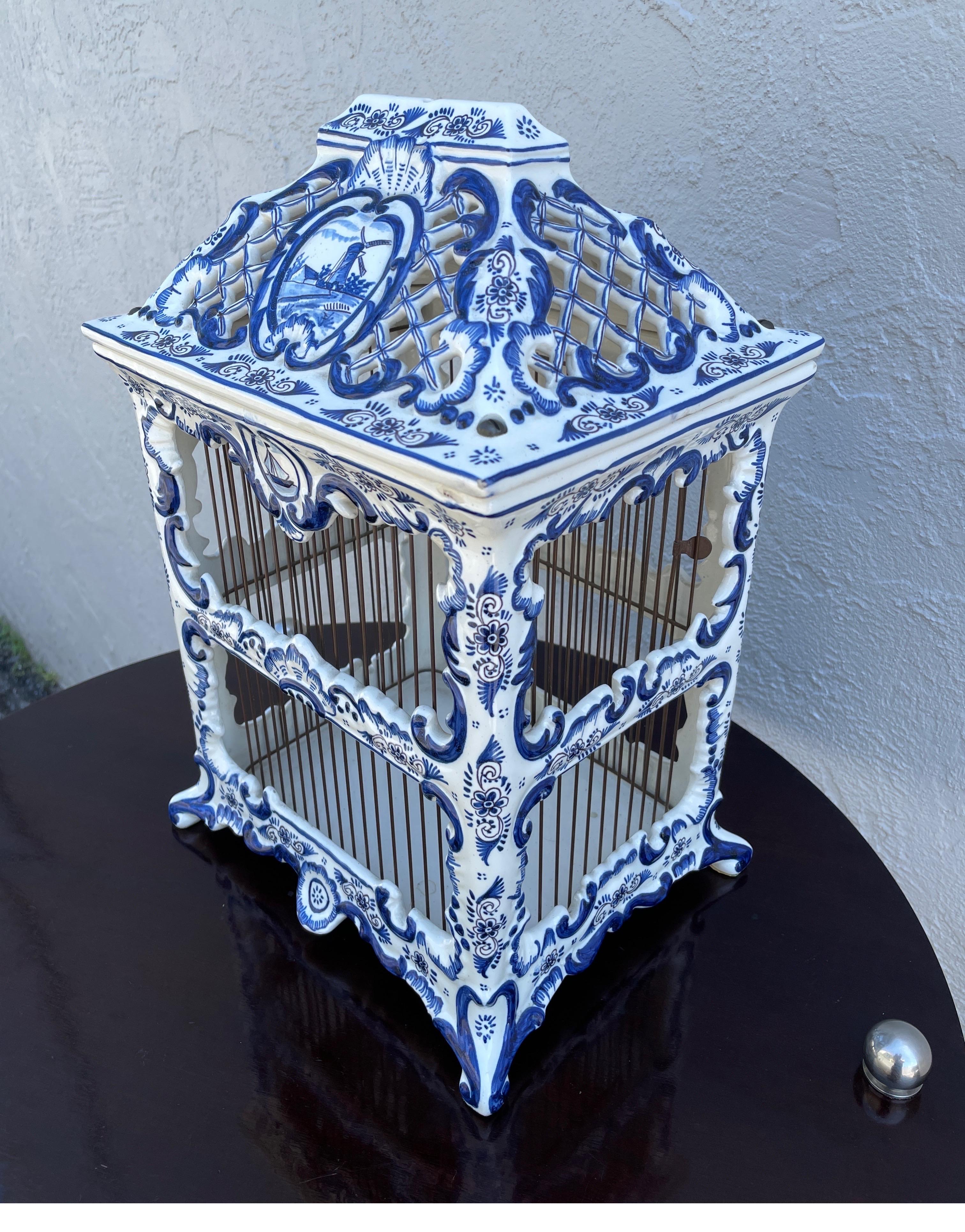 Pierced porcelain blue & white birdcage. Could easily be wired as a table lamp or hanging fixture.