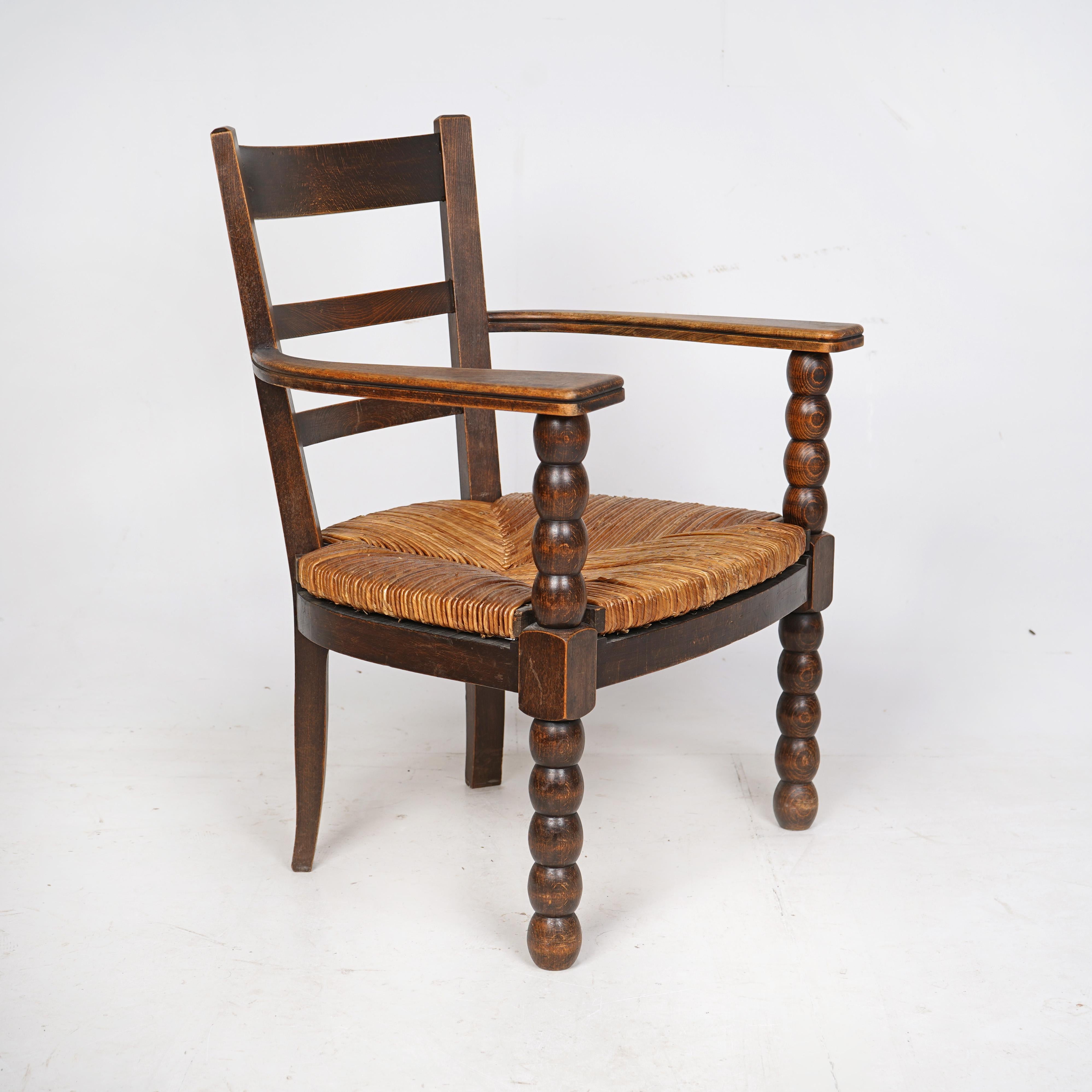 Vintage French Bobbin Wooden Armchair With Rush Seat  In Good Condition For Sale In Dorchester, GB