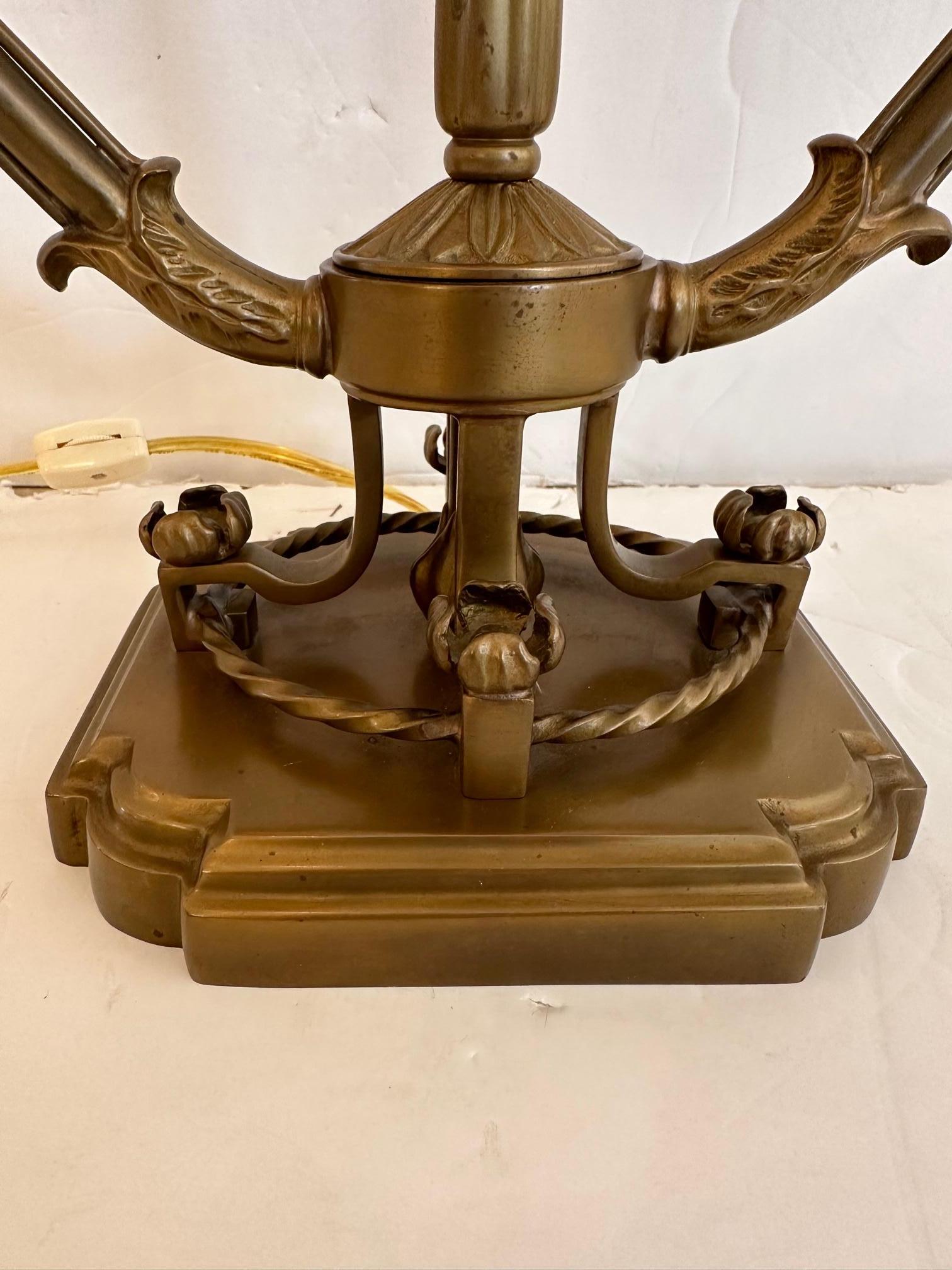 Vintage French bouillette style two arm table lamp with weathered aged patina having exceptional custom shade. Shade 17.5” W x 10.5” D x 8.5” H
Lamp itself is 9 w x 6 d.