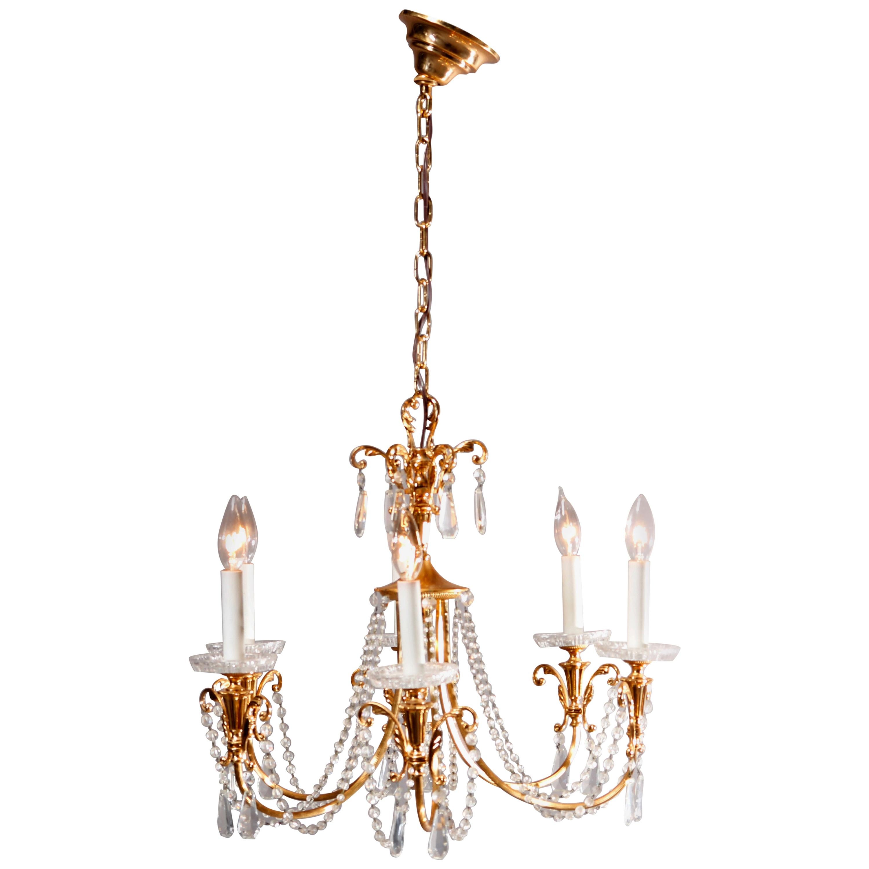 Vintage French Brass and Crystal Nine-Light Chandelier, circa 1930