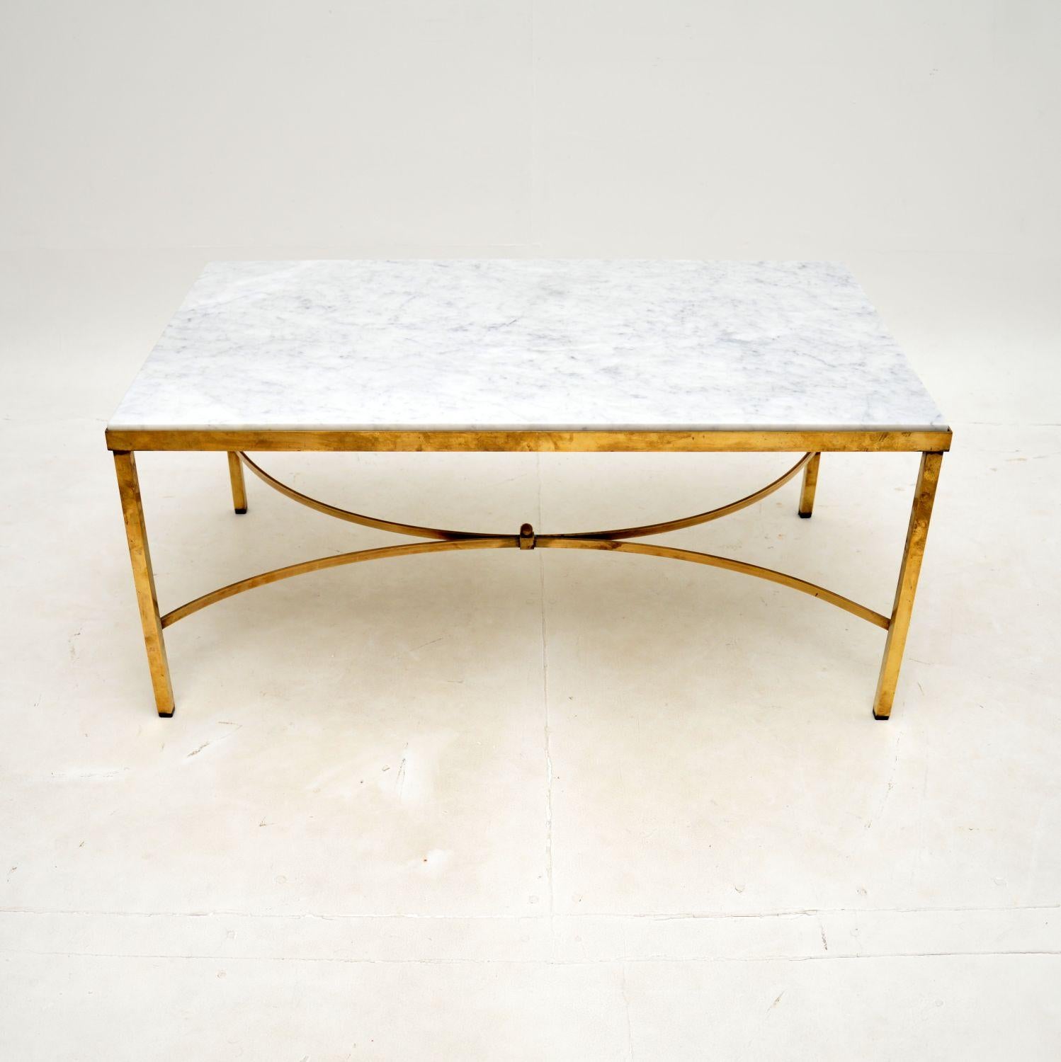 A stylish and very well made vintage French brass and marble coffee table. This was made in France in around the 1970’s.

The quality is superb, the solid brass frame has acquired a gorgeous patina over the years. It is a very useful size, and looks