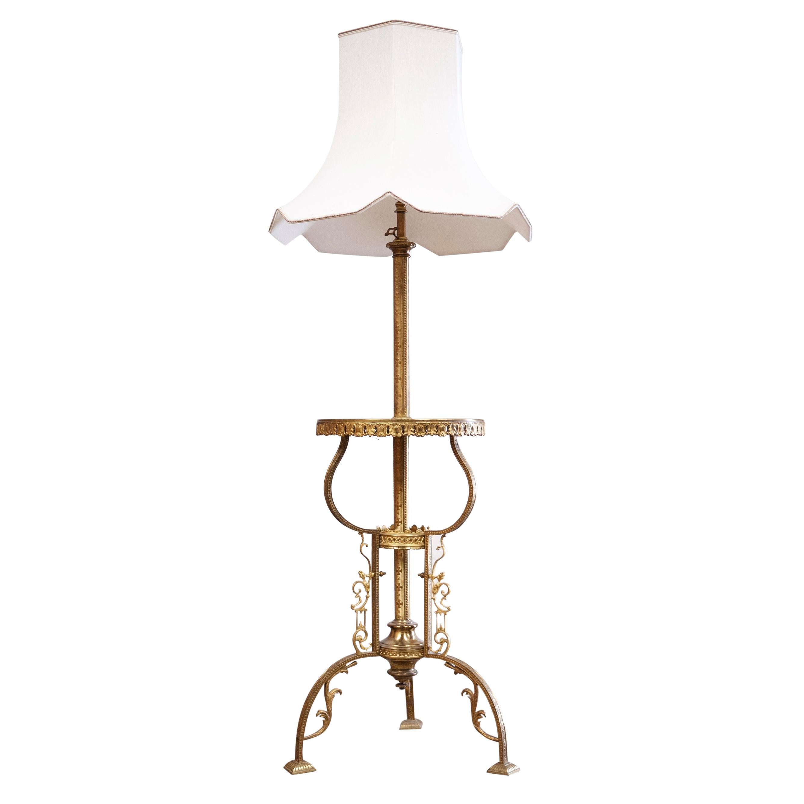A French brass floor lamp with an onyx drinks table.

Manufacturer - Unknown

Design Period - 1930 to 1939

Country of origin - French

Style - Vintage

Detailed Condition - Good — This vintage item remains fully functional, but it shows