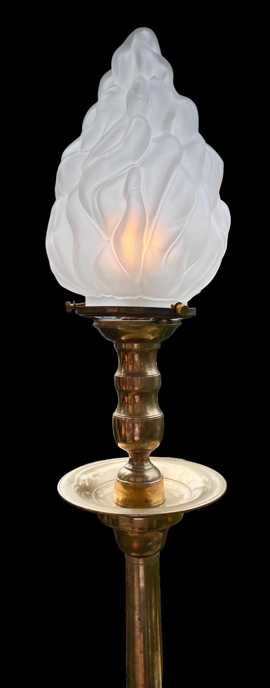 A vintage French brass candlestick lamp with beautiful, hand made frosted flame shade and in-line switch, c. 1930’s. Lovely in your library, entryway, living room, dining room or anywhere in a well appointed home. It is both simple and elegant to