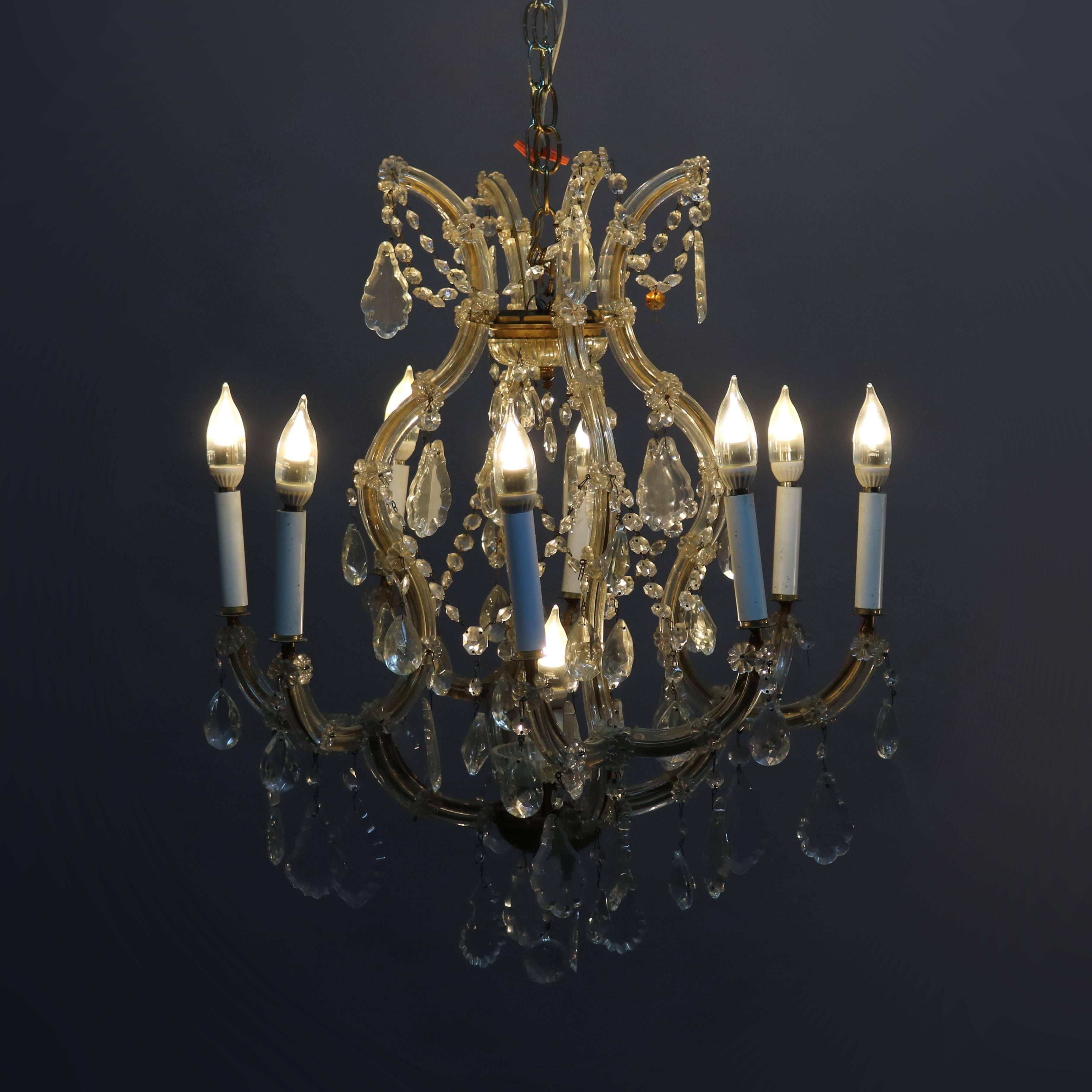 Cast Vintage French Brass and Crystal Nine-Light Chandelier, circa 1930