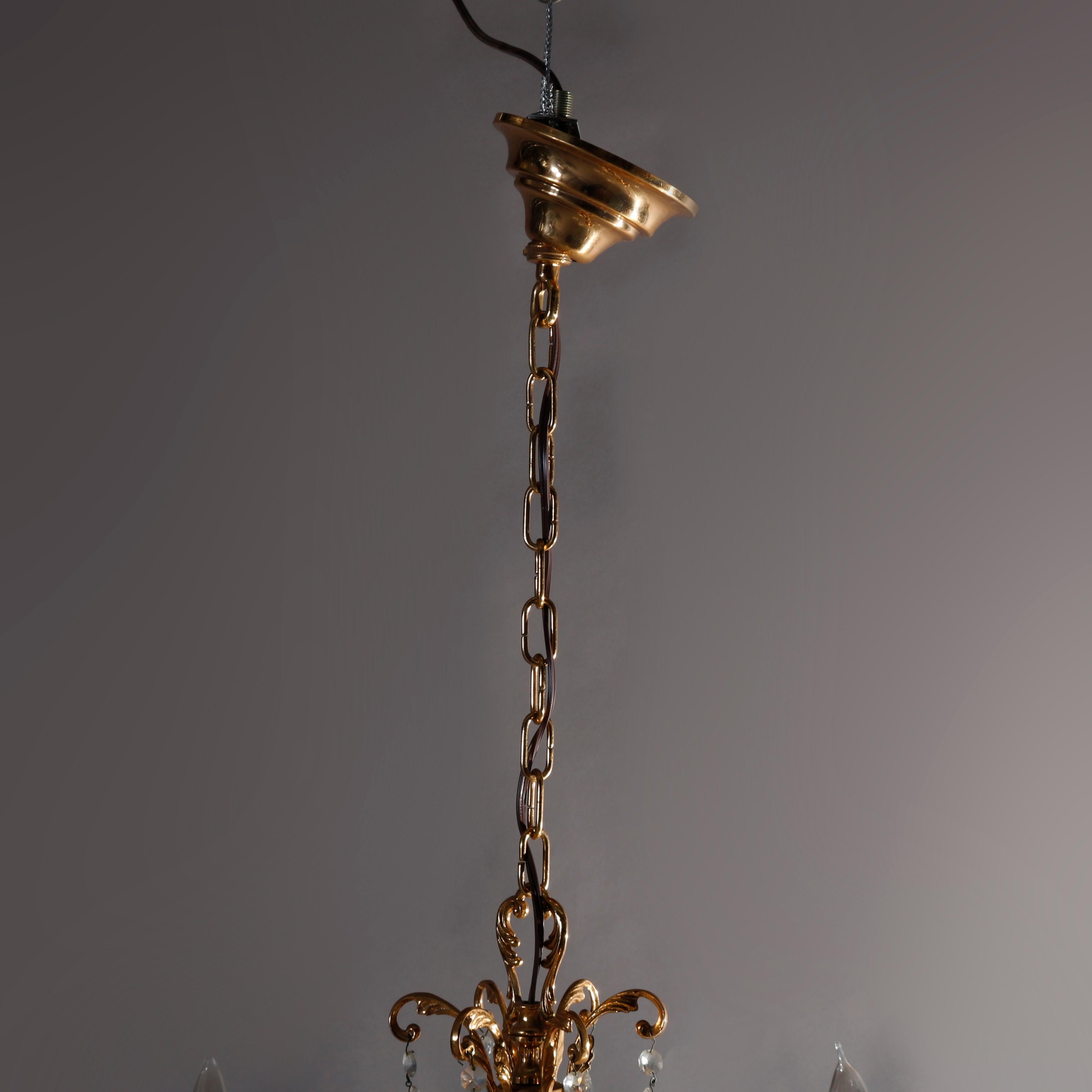 20th Century Vintage French Brass and Crystal Nine-Light Chandelier, circa 1930