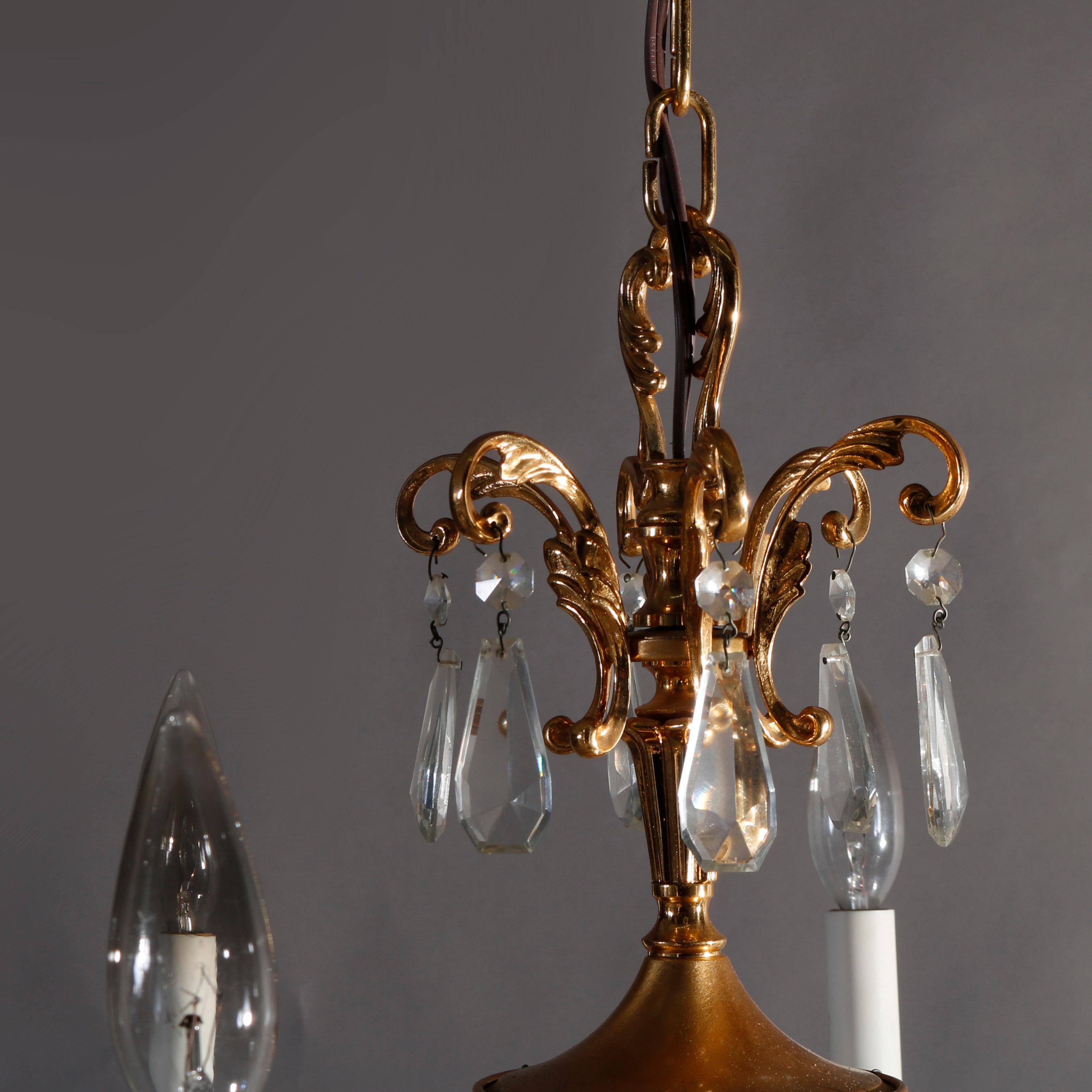 Metal Vintage French Brass and Crystal Nine-Light Chandelier, circa 1930