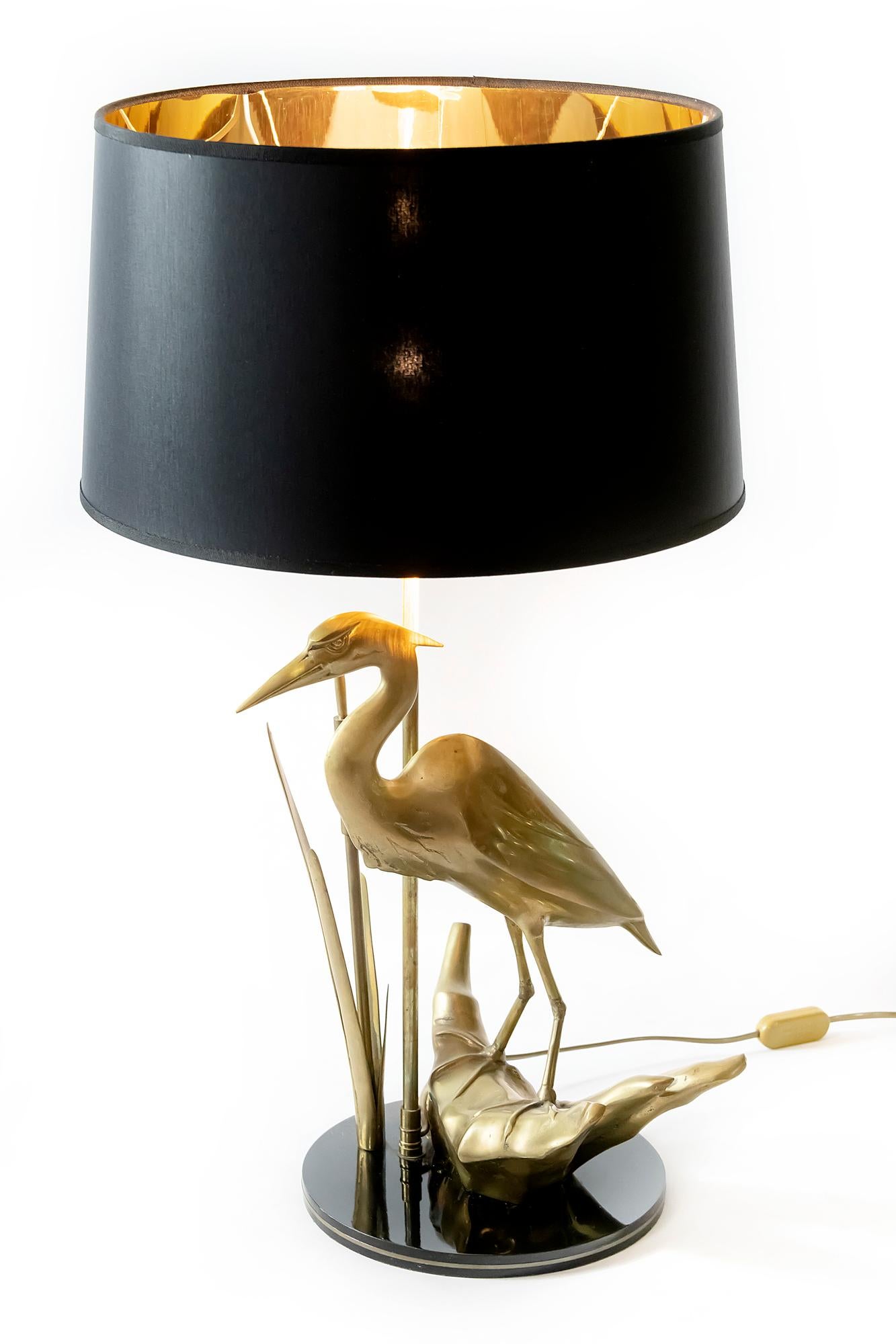 Vintage French table lamp with brass bird and floral elements on wooden base colored with glossy black colour, by Maison Charles.
Lamp is with the new made satin finish black color textile shade with gold inside.
Lamp includes E27 bulb.
 