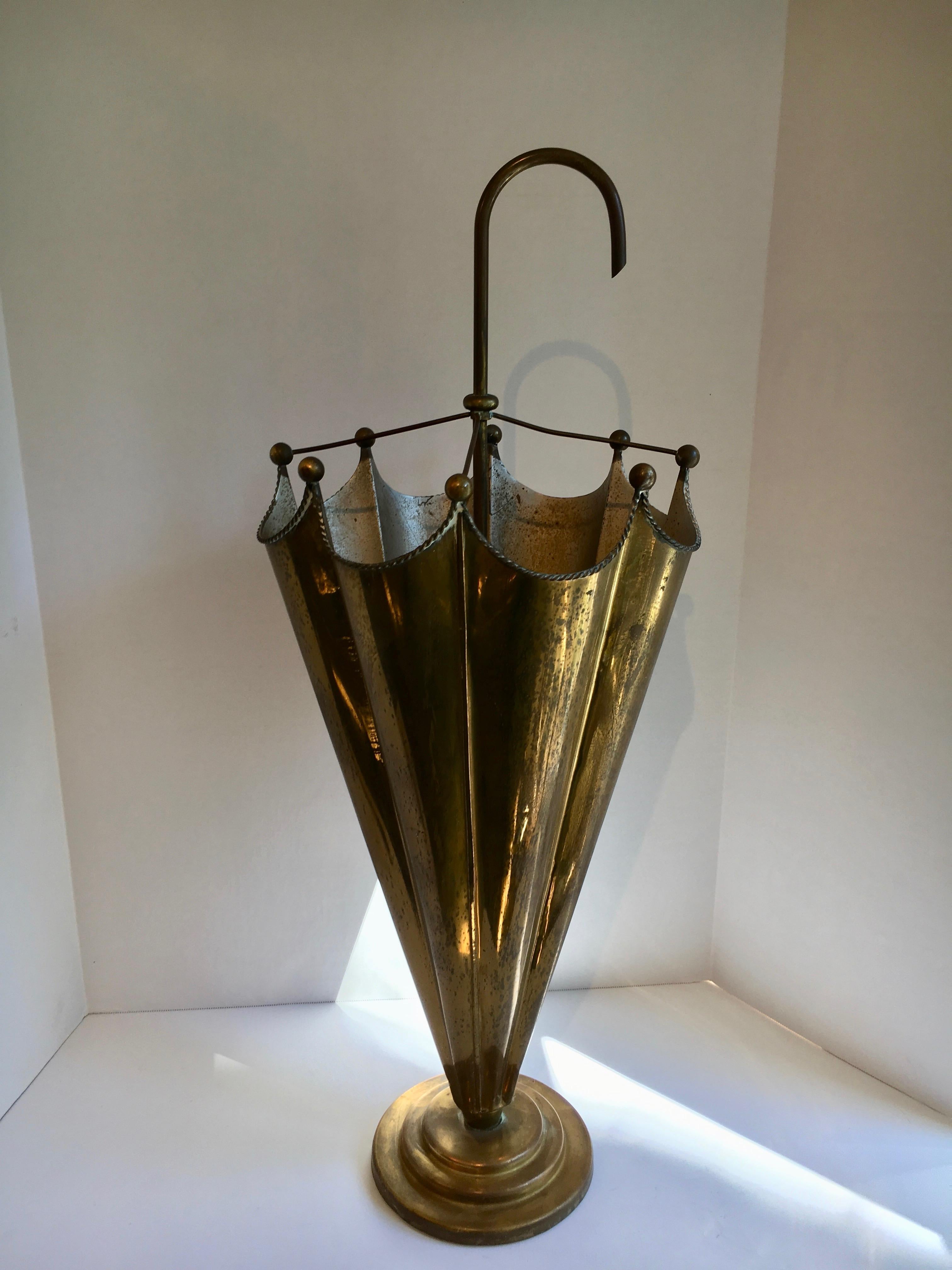 Vintage French brass umbrella stand, in the shape of an umbrella, this stand is quite handsome, with very nice detailing and extremely functional.