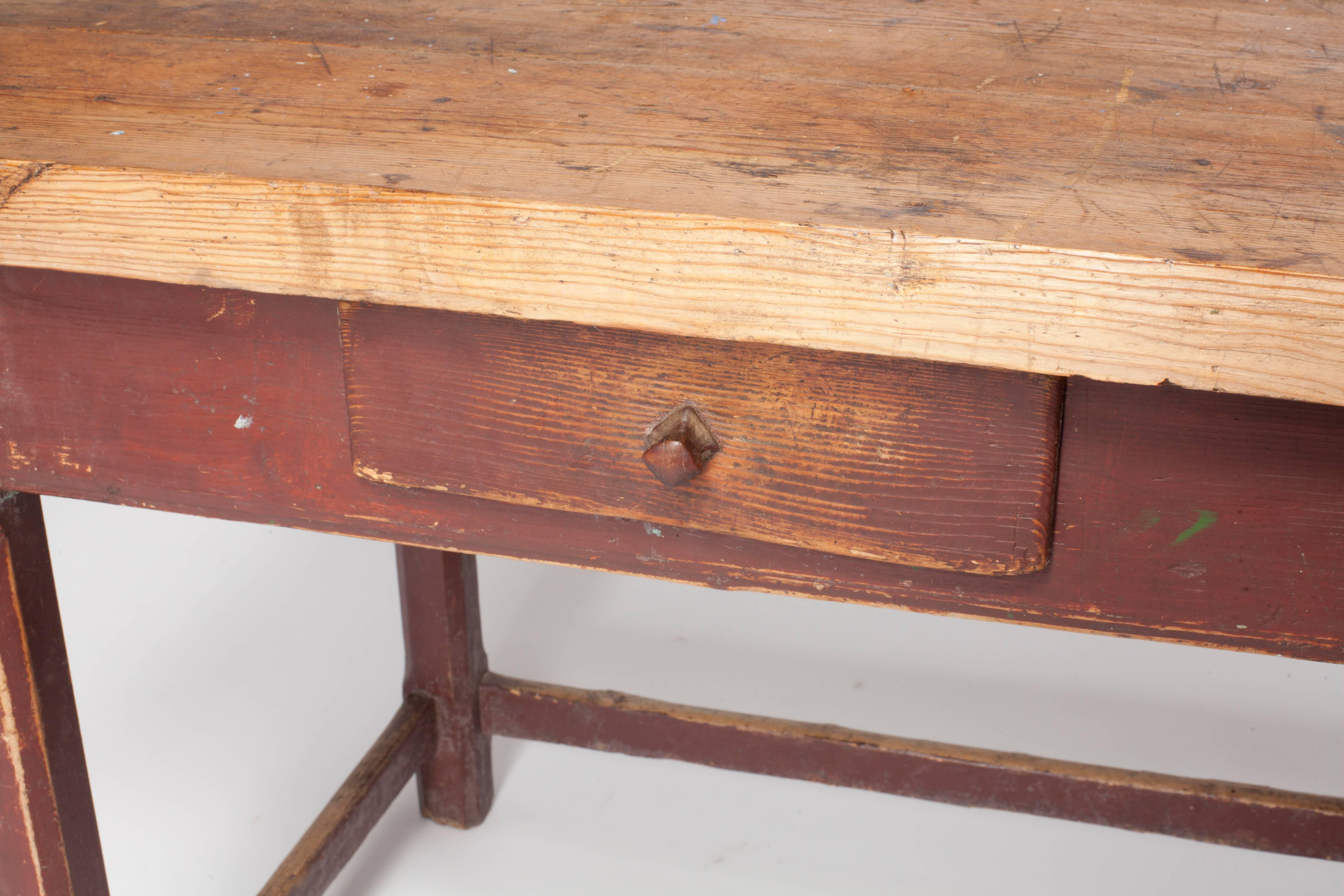 Vintage French butcher block island table. Table base is dark stained with single drawer.