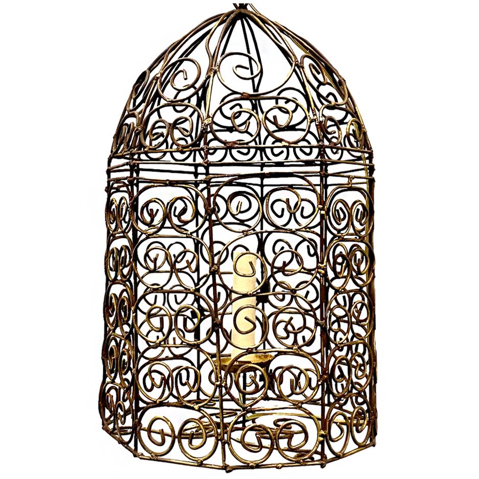A circa 1950's French gilt metal cage lantern with an interior light.

Measurements:
Diameter: 10.5