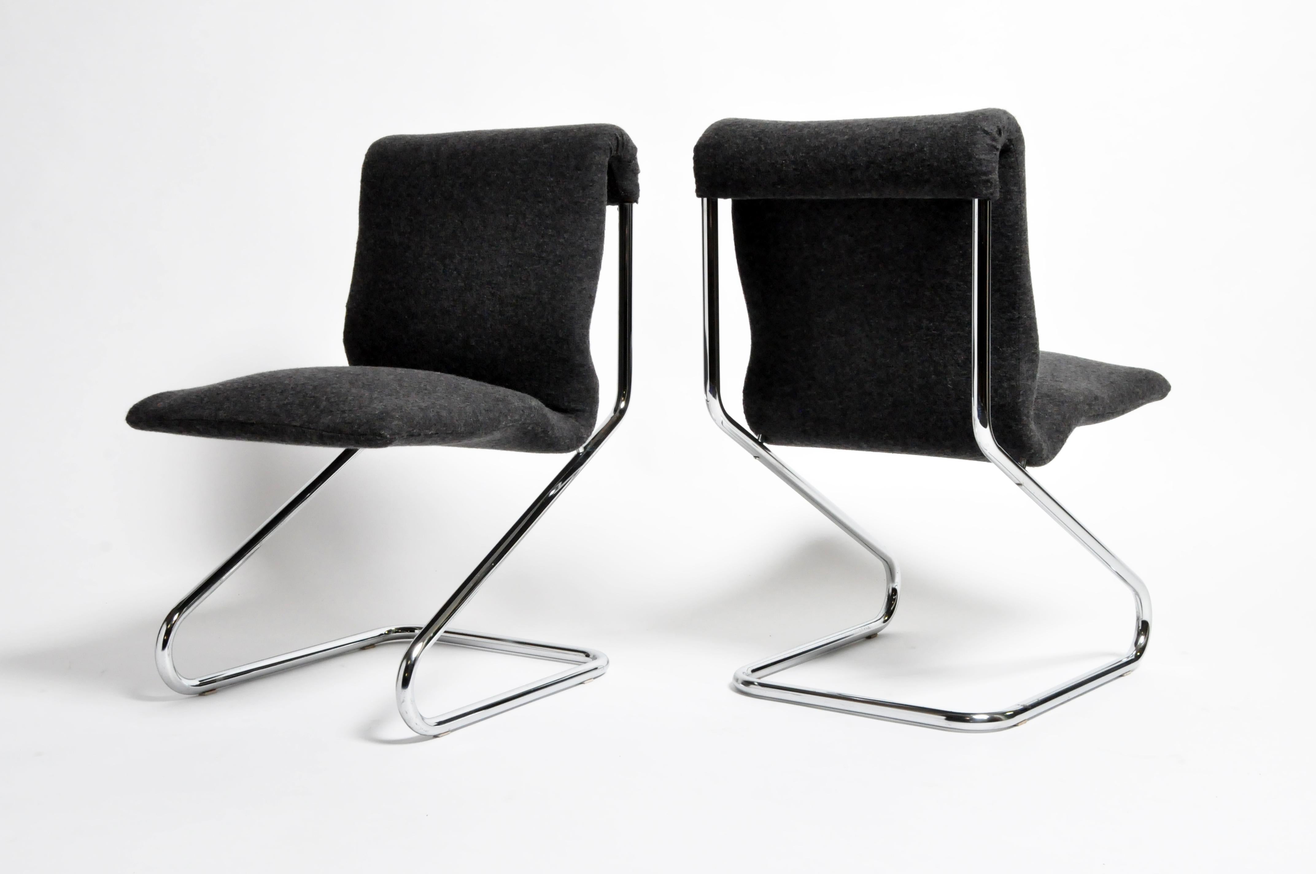 These stylish chrome chairs exemplify the spirit of French post-war modernism. They are sleekly comfortable and have meticulously reupholstered in 100% wool. Paris, 1960's. Price is for each chair.