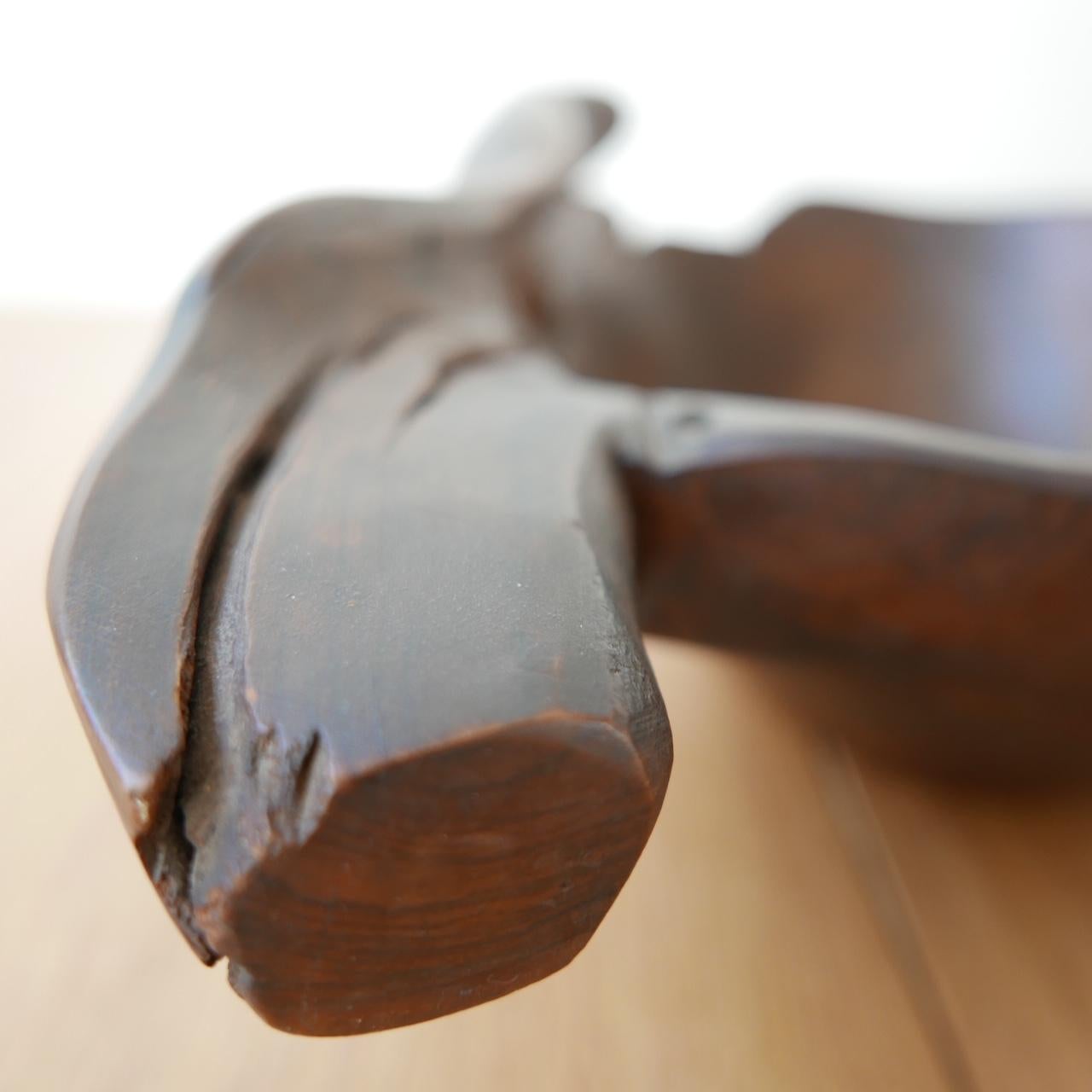 A vintage carved out wooden root bowl. 

Ideal for a quirky fruit bowl or coffee table objet bowl.
     