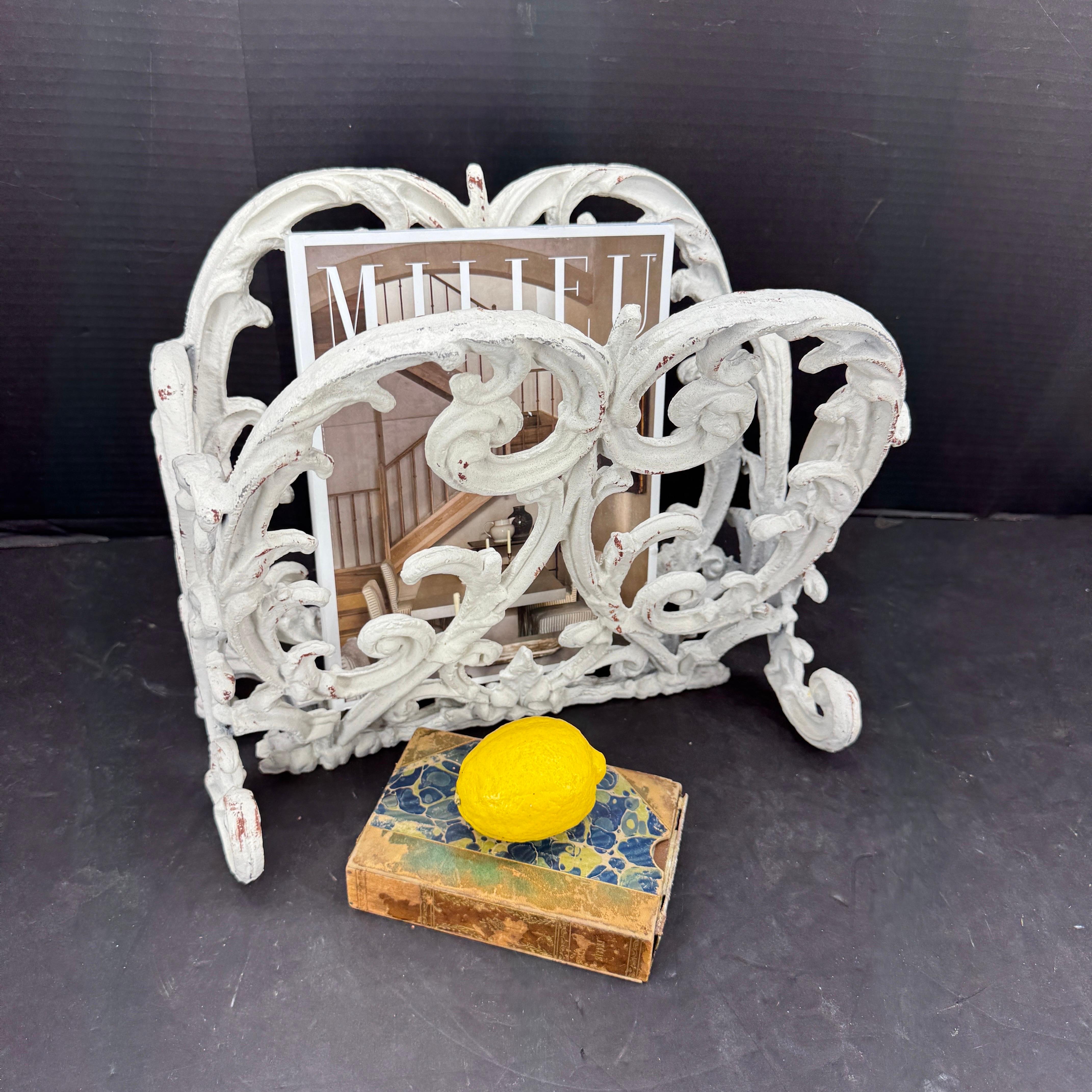 Elegant and versatile magazine holder with both form and function. This  sturdy piece looks wonderful standing alone or functional holding newspapers or magazines. The stylish design makes this piece a wonderful decorative choice in any formal or