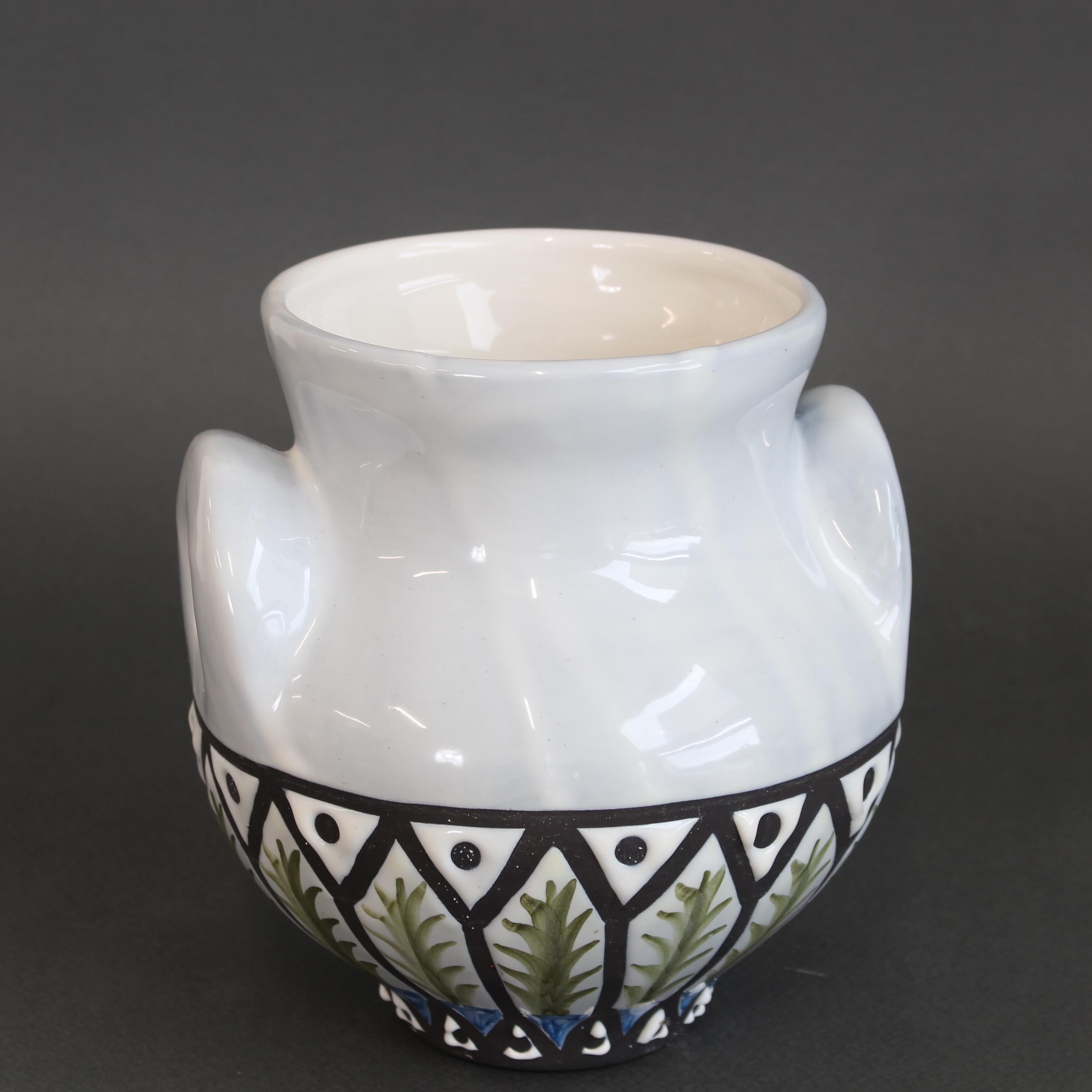 An 'eared' vase (Vase à Oreilles) by artist Roger Capron (circa 1950s). In excellent overall condition, this vase (1950s) is a quintessential example of collectible Capron and a trademark of his style from this era. A unique piece of Capron