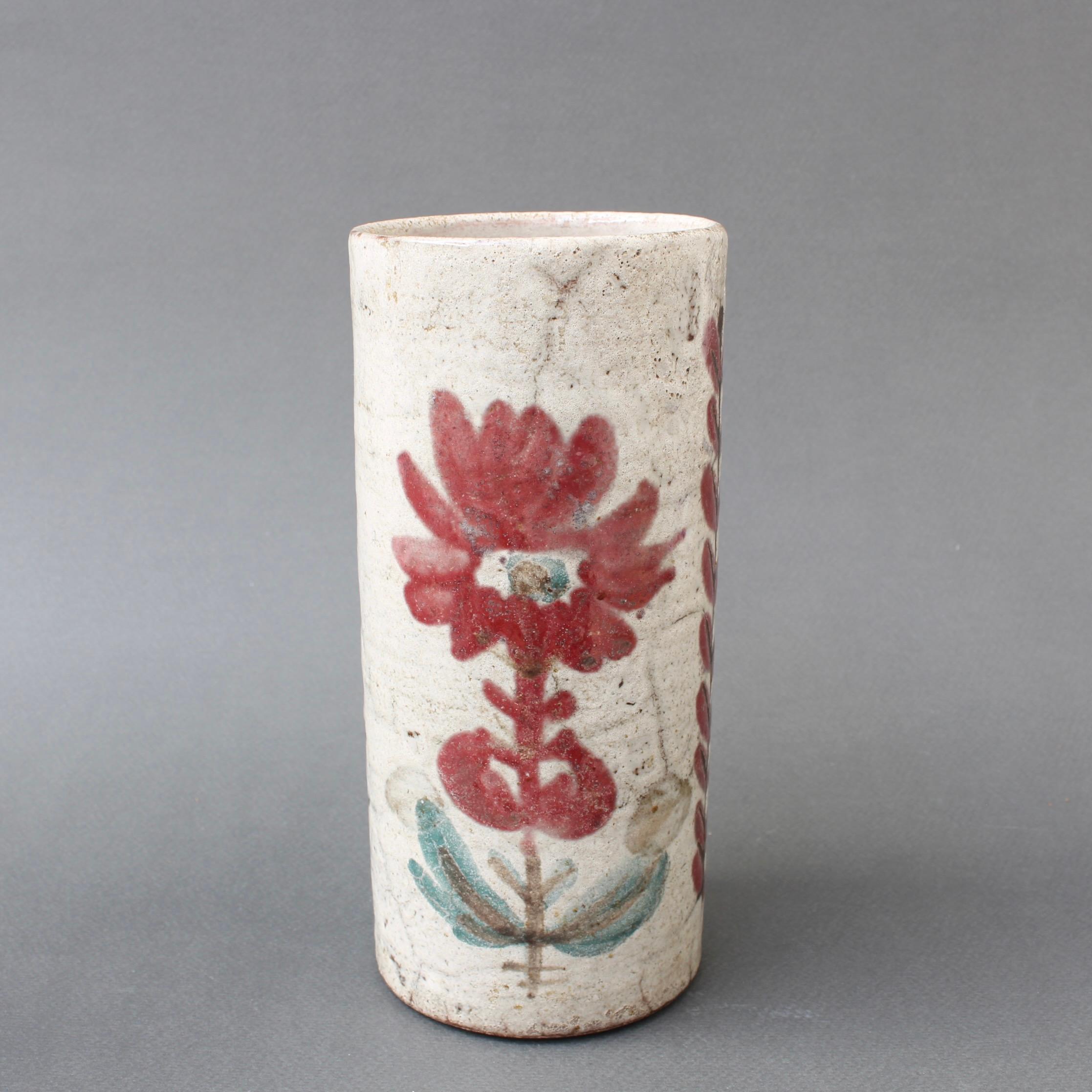 Vintage French ceramic flower vase by Le Mûrier (circa 1960s). A charming cylindrical vase in the unmistakable Le Mûrier Provençal style with their trademark stylised mulberry flower and upright leaf motif. The underlying glaze is a delicate
