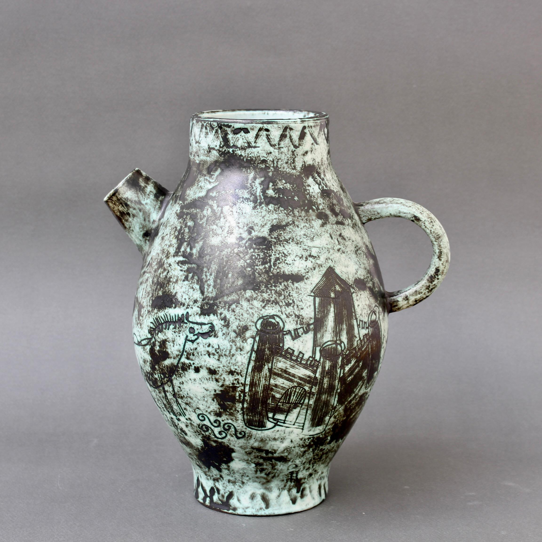 Vintage French ceramic vase by Jacques Blin (circa 1950s). This elegant piece has Blin's trademark cloudy glaze with castle and duelling knights motif. The incised decoration also includes images of an ancient catapult weapon and a horse. This is a