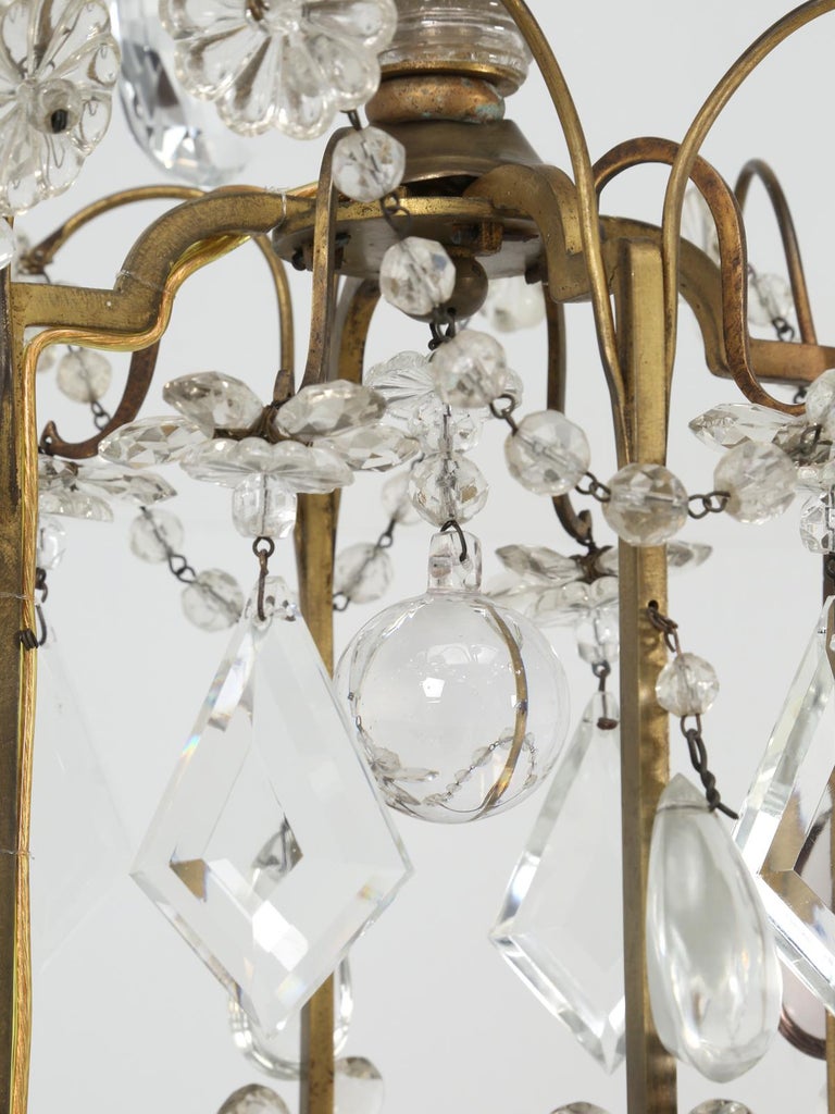 Mid-20th Century Vintage French Chandelier Attributed to Maison Jansen in Bronze and Crystal For Sale