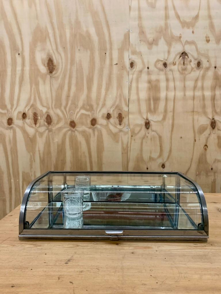 Vintage French chrome glass table display-cabinet. The lid can be locked in an open position.