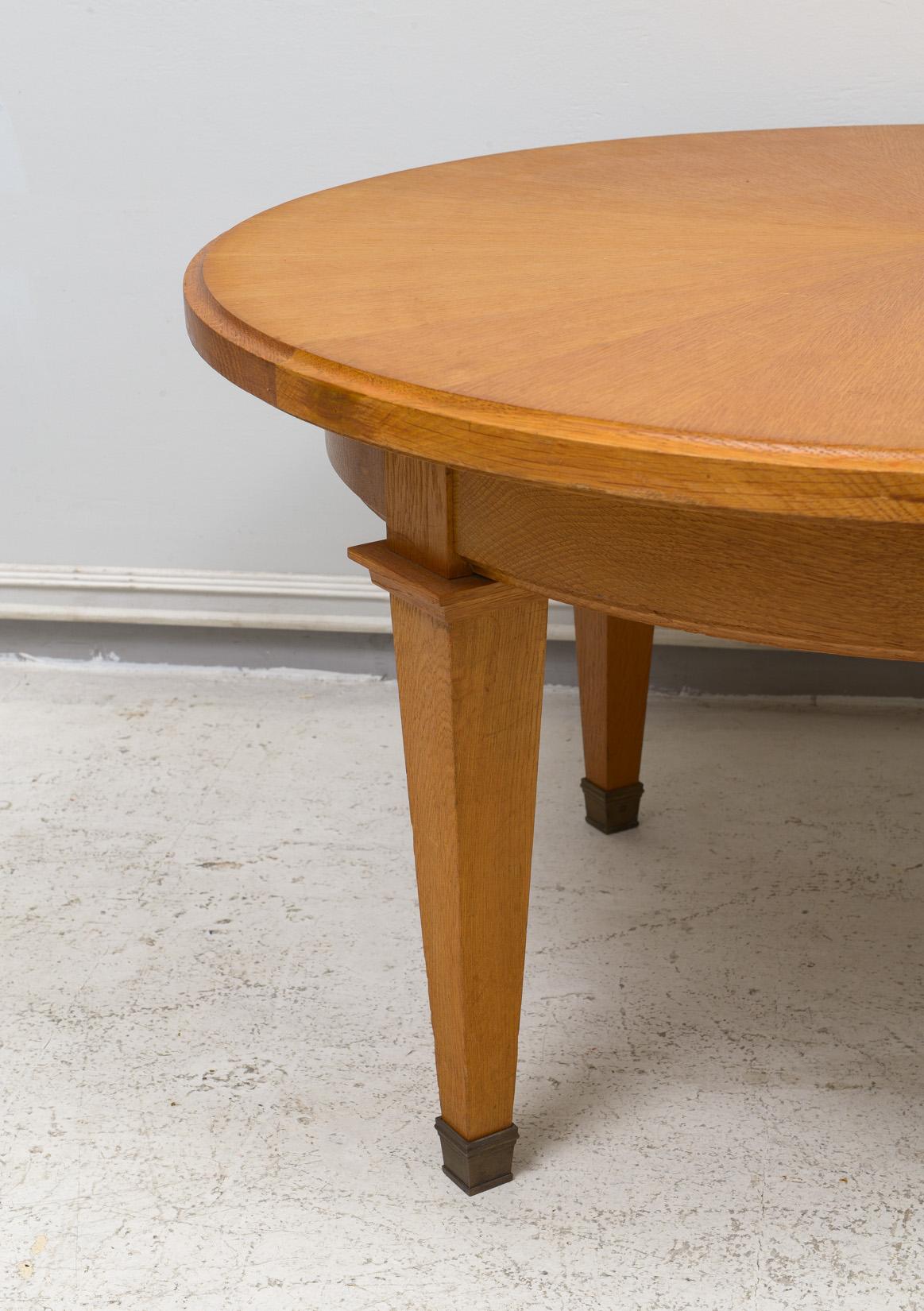 20th Century Vintage French Circular Coffee Table in Oak on Tapered Legs with Brass Sabots For Sale