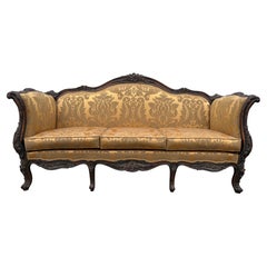 Vintage French country inspired hand carved Damask sofa
