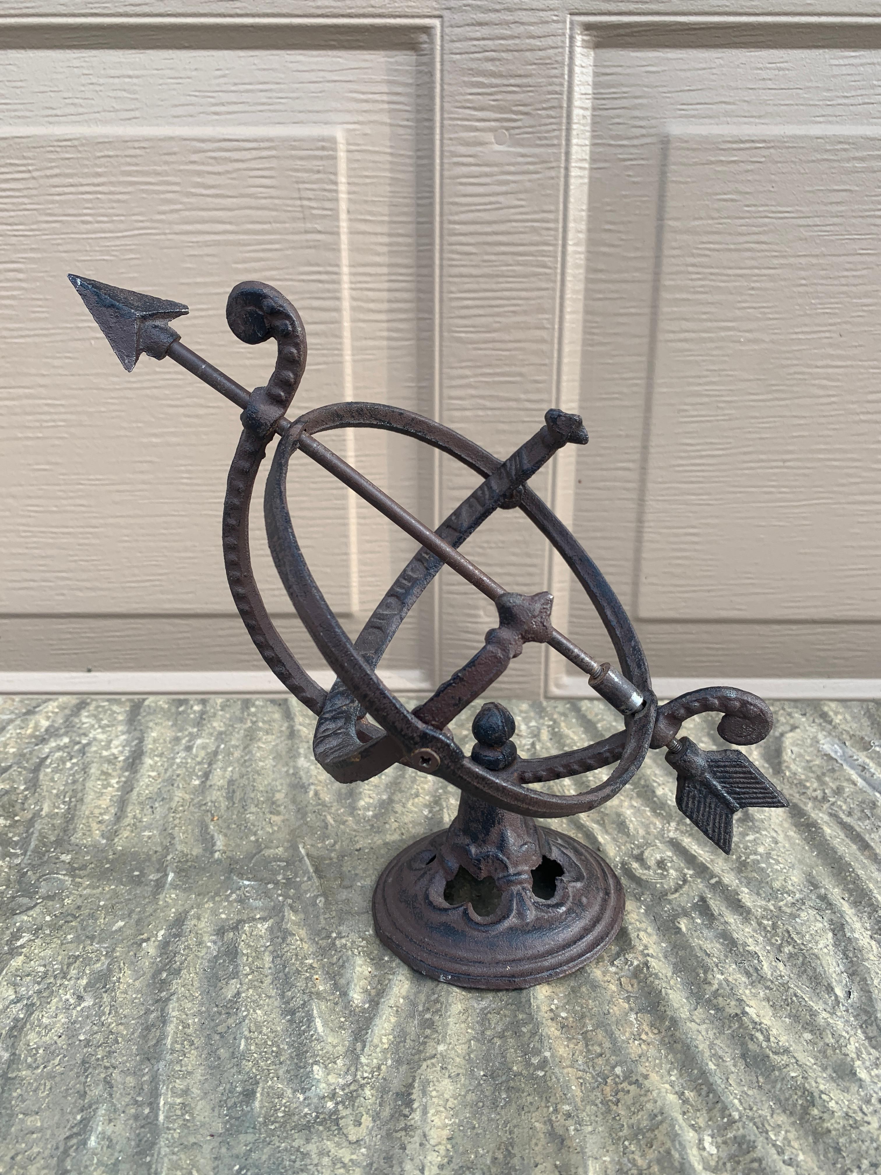 A stunning vintage English or French country or Neoclassical style iron garden armillary sundial with Roman numerals

USA, Late 20th Century

Measures: 8.5