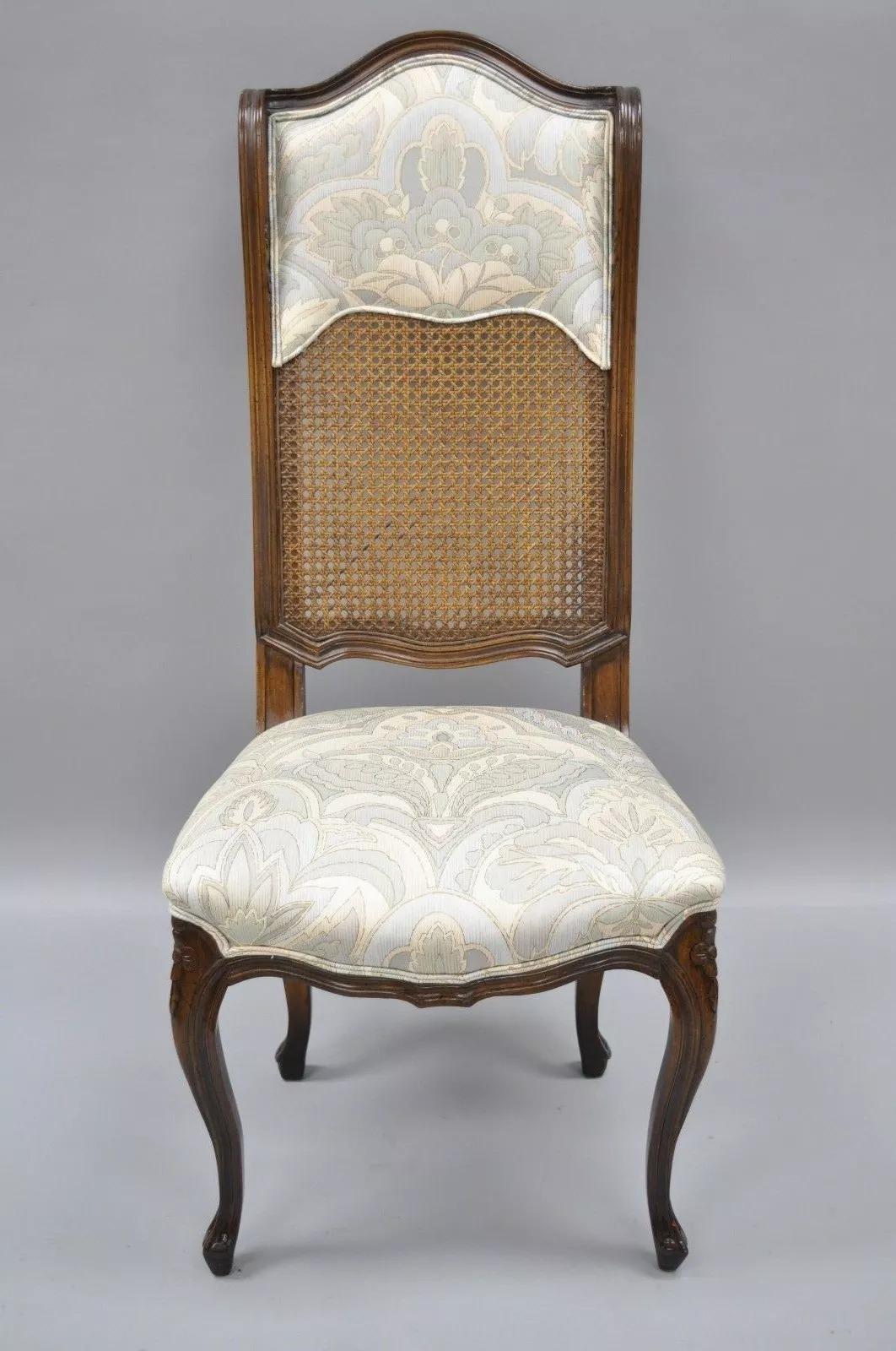 Vintage French Country Louis XV Style High Cane Back Carved Walnut Side Chair. Item features a curved back, cane & upholstered backrest, solid wood construction, beautiful woodgrain, nicely carved details, cabriole legs, quality American