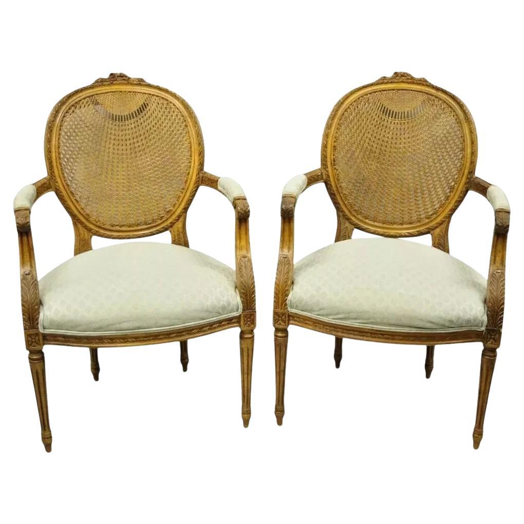 Vintage French Country Louis XVI Style Oval Cane Back Walnut Arm Chairs - a Pair