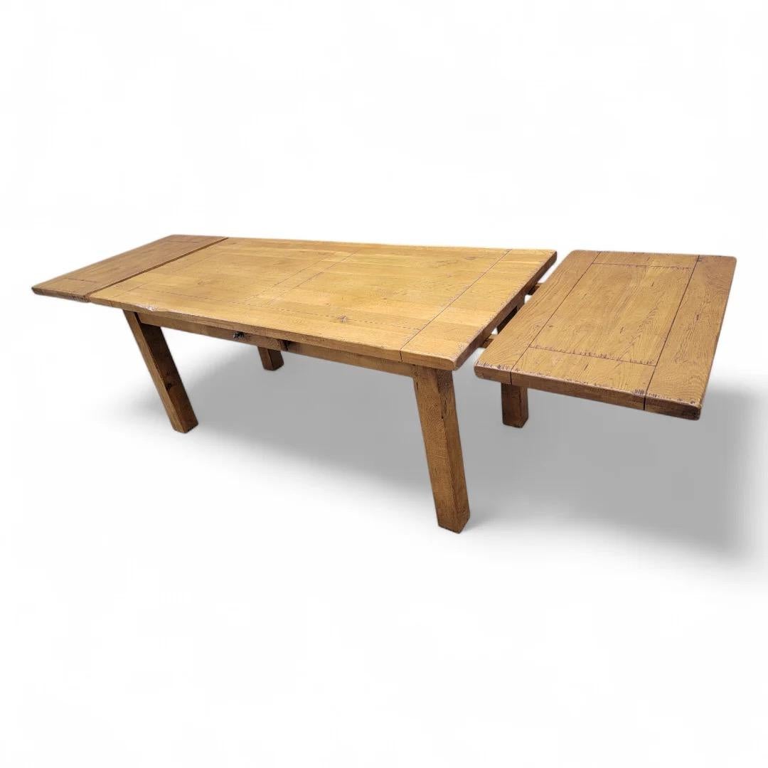 Vintage French Country Farmhouse Oak Rectangular 2 Leaf Extending Dining Table with 8 High Ladder Back Rush Seat Chairs 

This vintage French country farmhouse dining set features a beautifully crafted oak rectangular table, complete with two