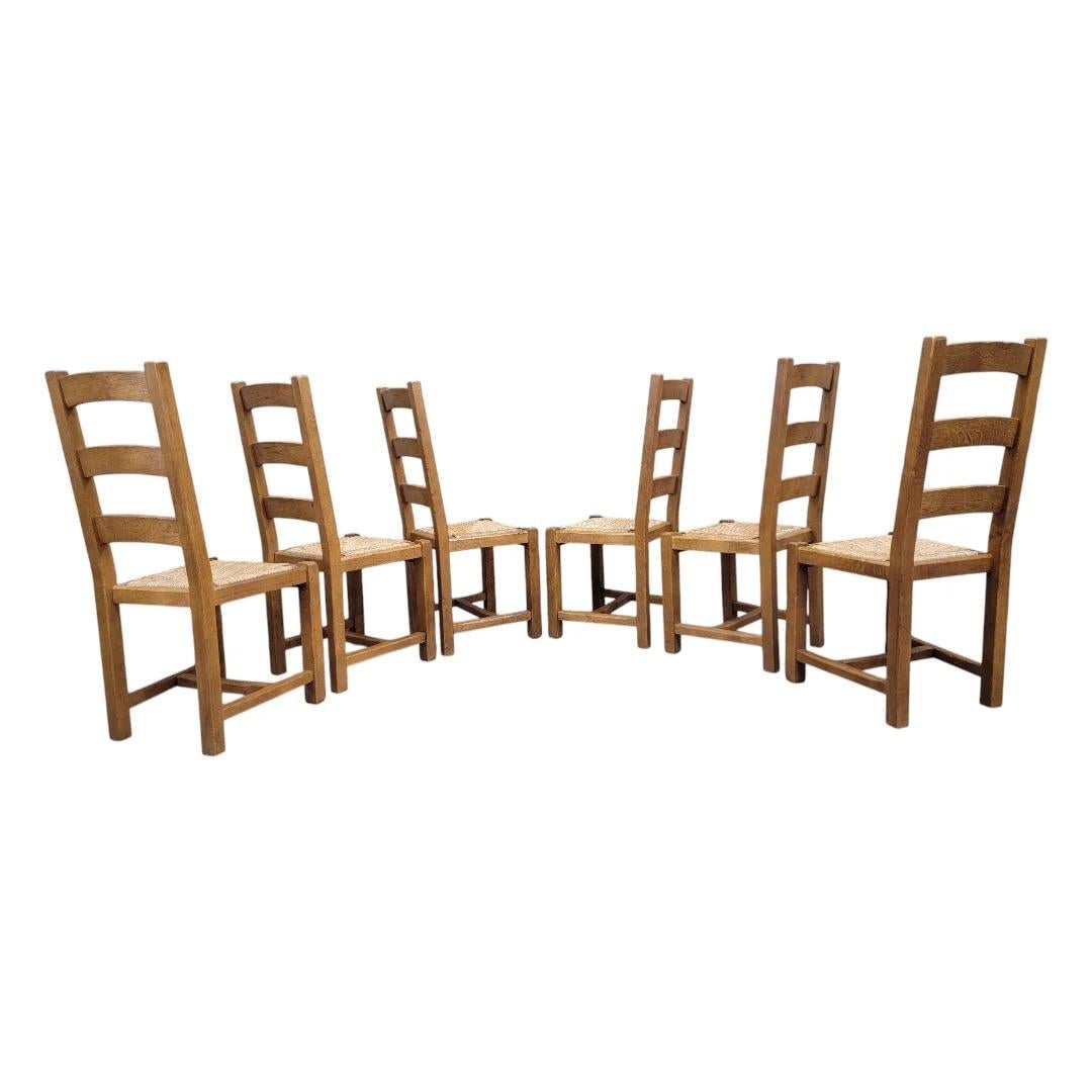 20th Century Vintage French Country Oak Extension Dining Table With 8 Ladder Back Chairs For Sale