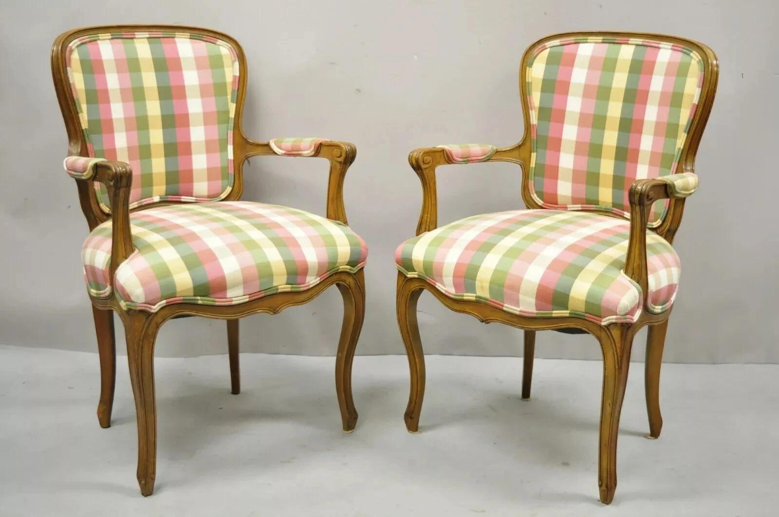 Vintage French Country Provincial Arm Chairs by Simon Loscertales Bona - a Pair. Item features pink and green plaid upholstery, solid wood frames, distressed finish, original label, cabriole legs, quality craftsmanship. Circa Mid 20th Century.