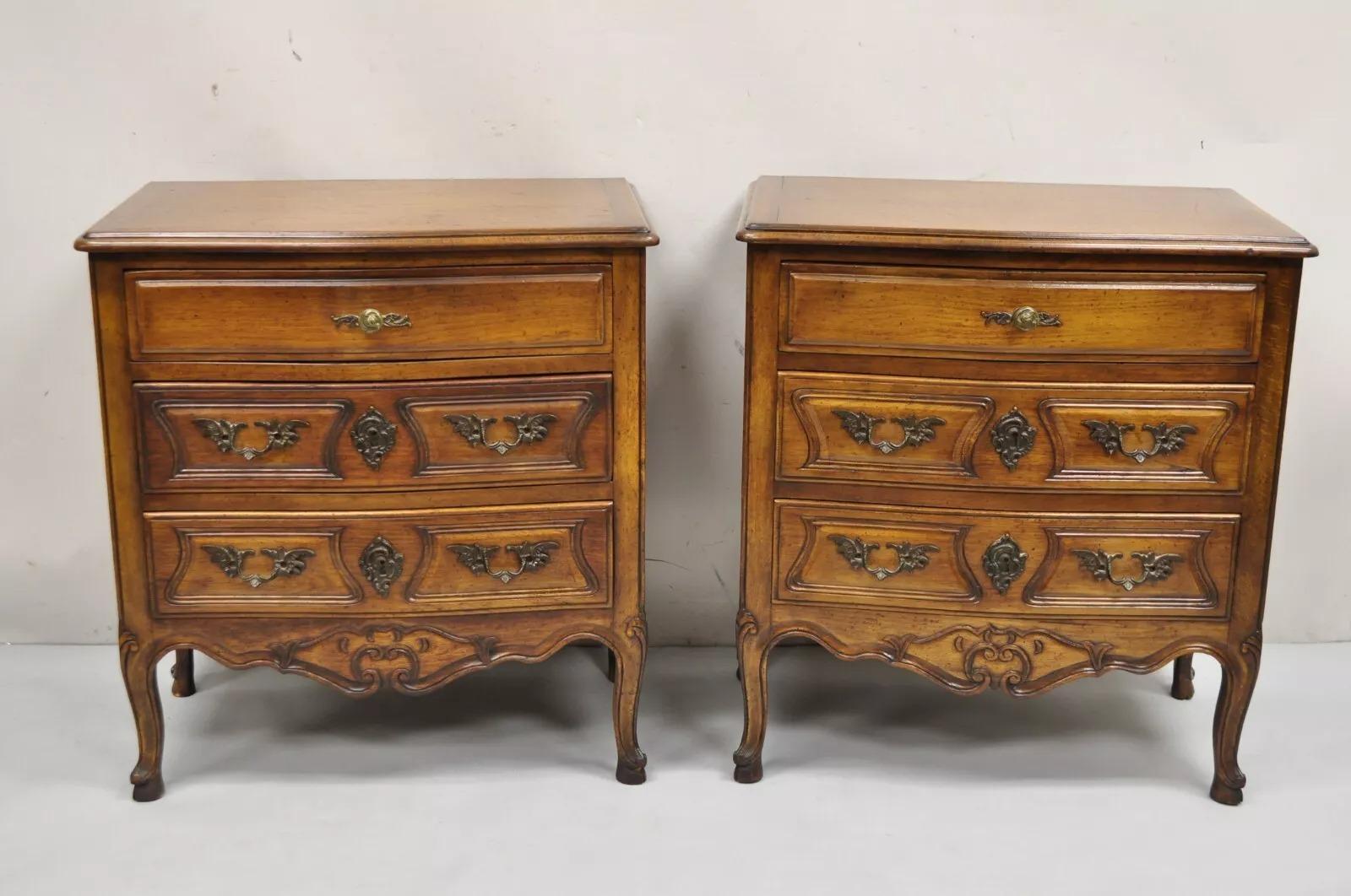Vintage French Country Provincial Carved Walnut Italian Nightstands - a Pair. Item features 3 dovetailed lined drawers, lightly distressed finish, shapely cabriole legs, solid brass hardware, quality Italian craftsmanship, great style and form.